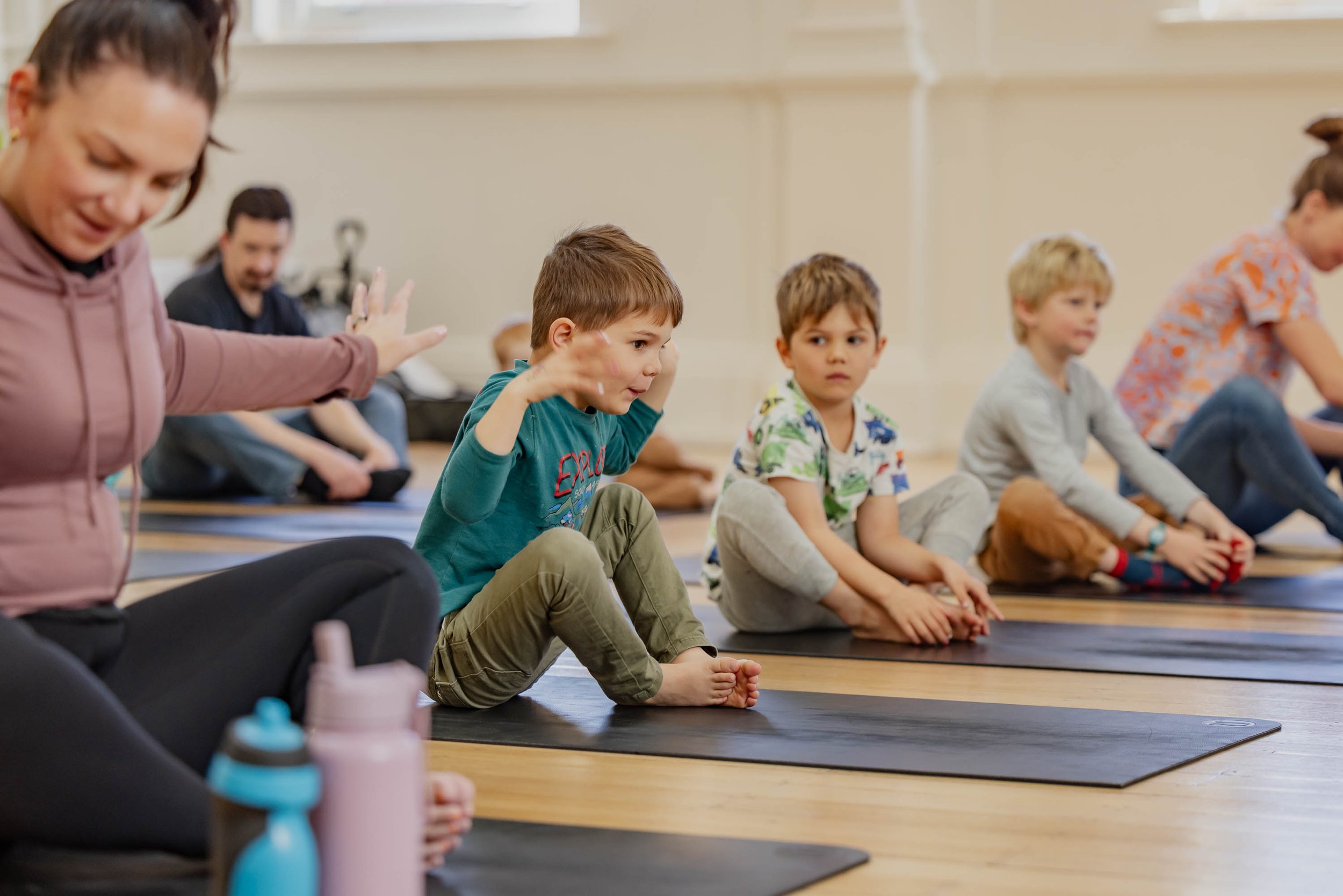 Families doing yoga