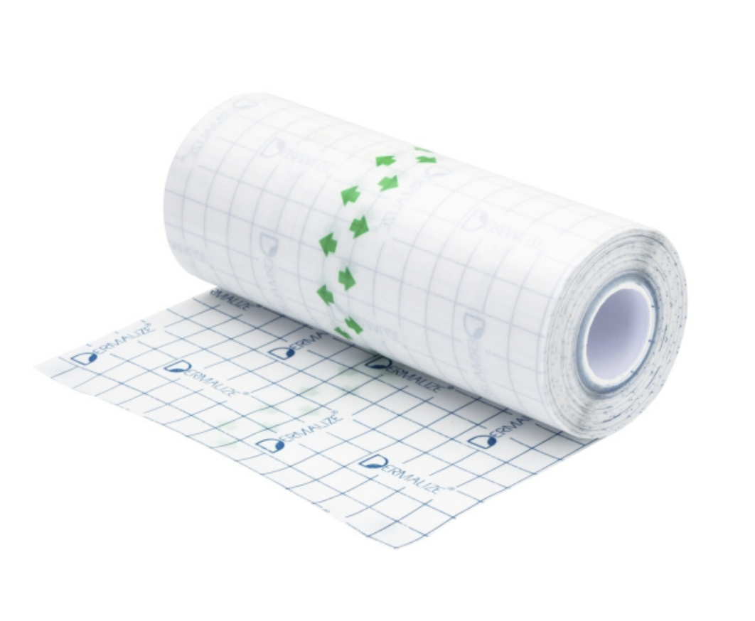 A roll of medical or surgical adhesive tape with grid lines, partially unrolled to show the grid pattern and branding.