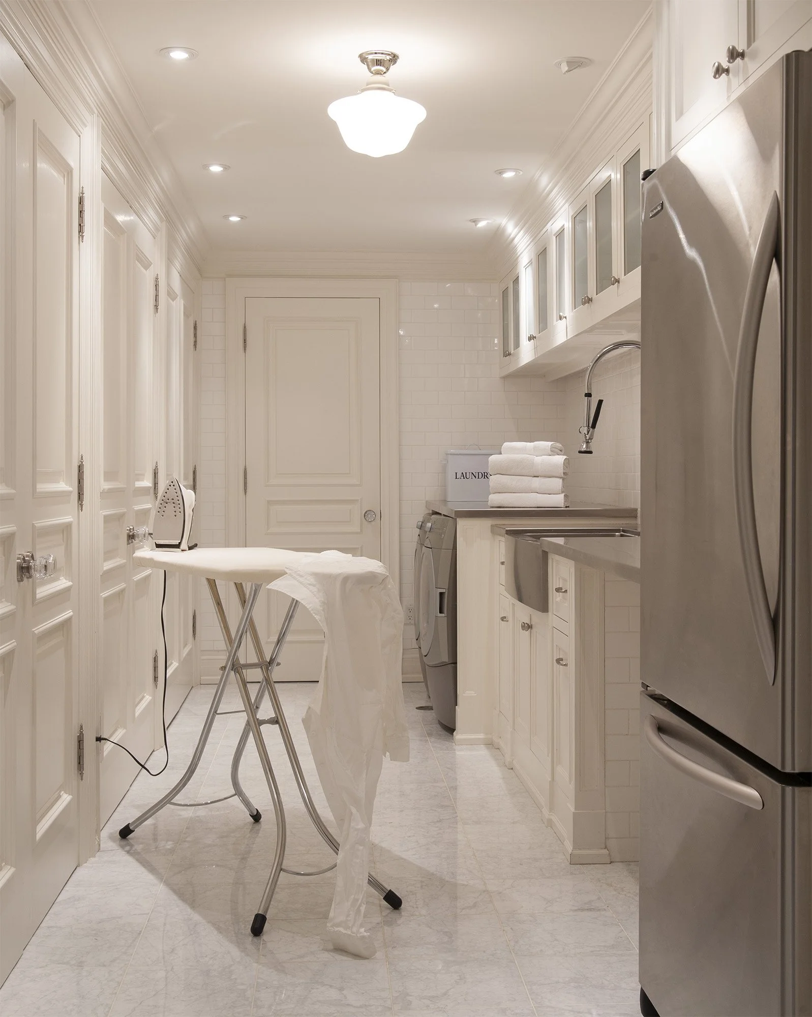 Bright white basement laundry