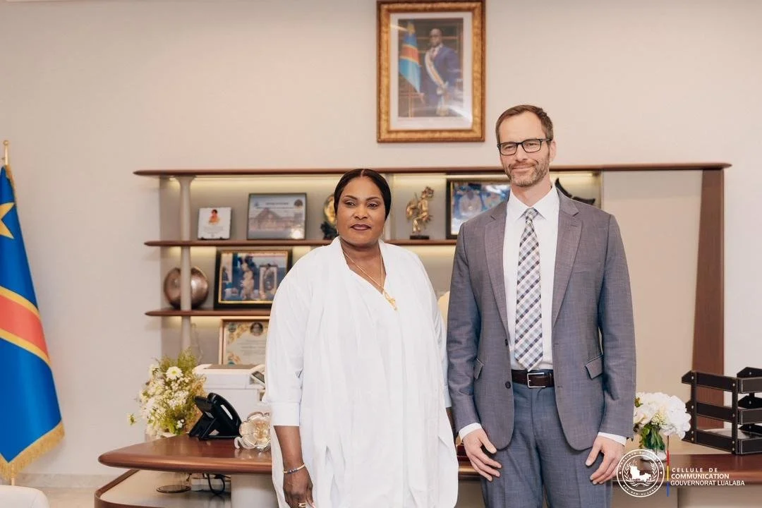 Virtus CFO Andrew Powch standing with Her Excellency Governor Fifi Masuka Saini.jpeg