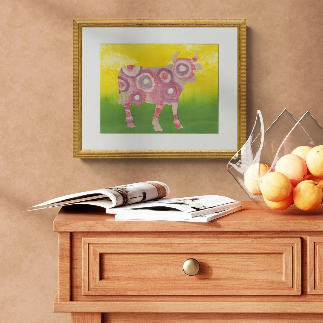 cow-a-bowl-of-fruit-sitting-on-a-side-table.jpg