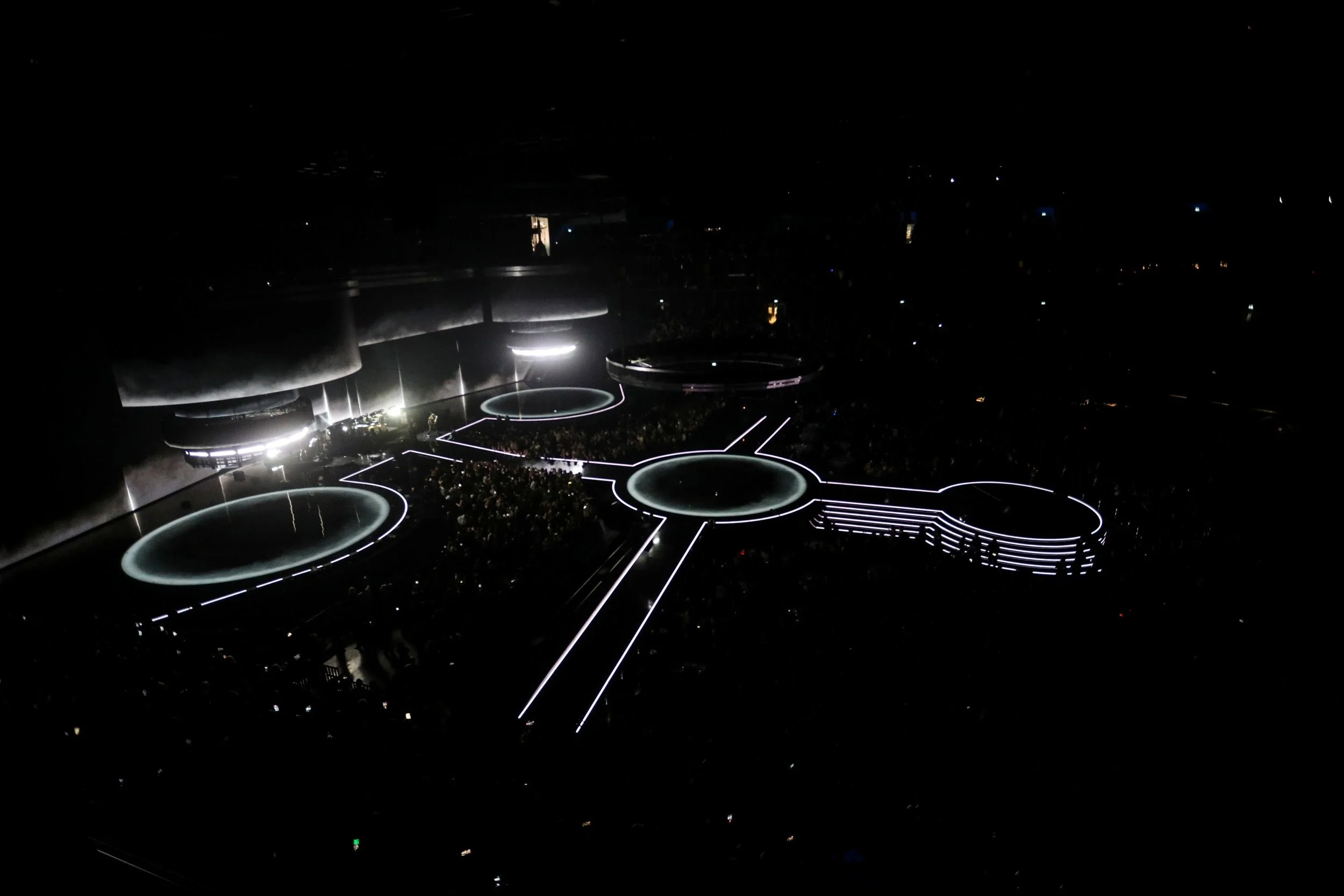 picture of circular stages lit up in white representing spaceships