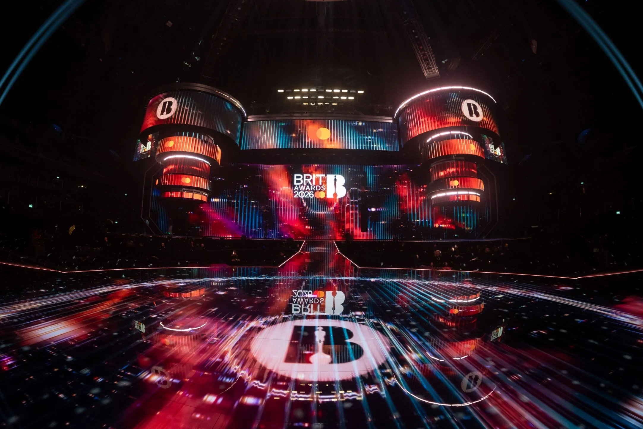 Picture of Brits awards stage, spaceships, big Brits logo on lower stage projected