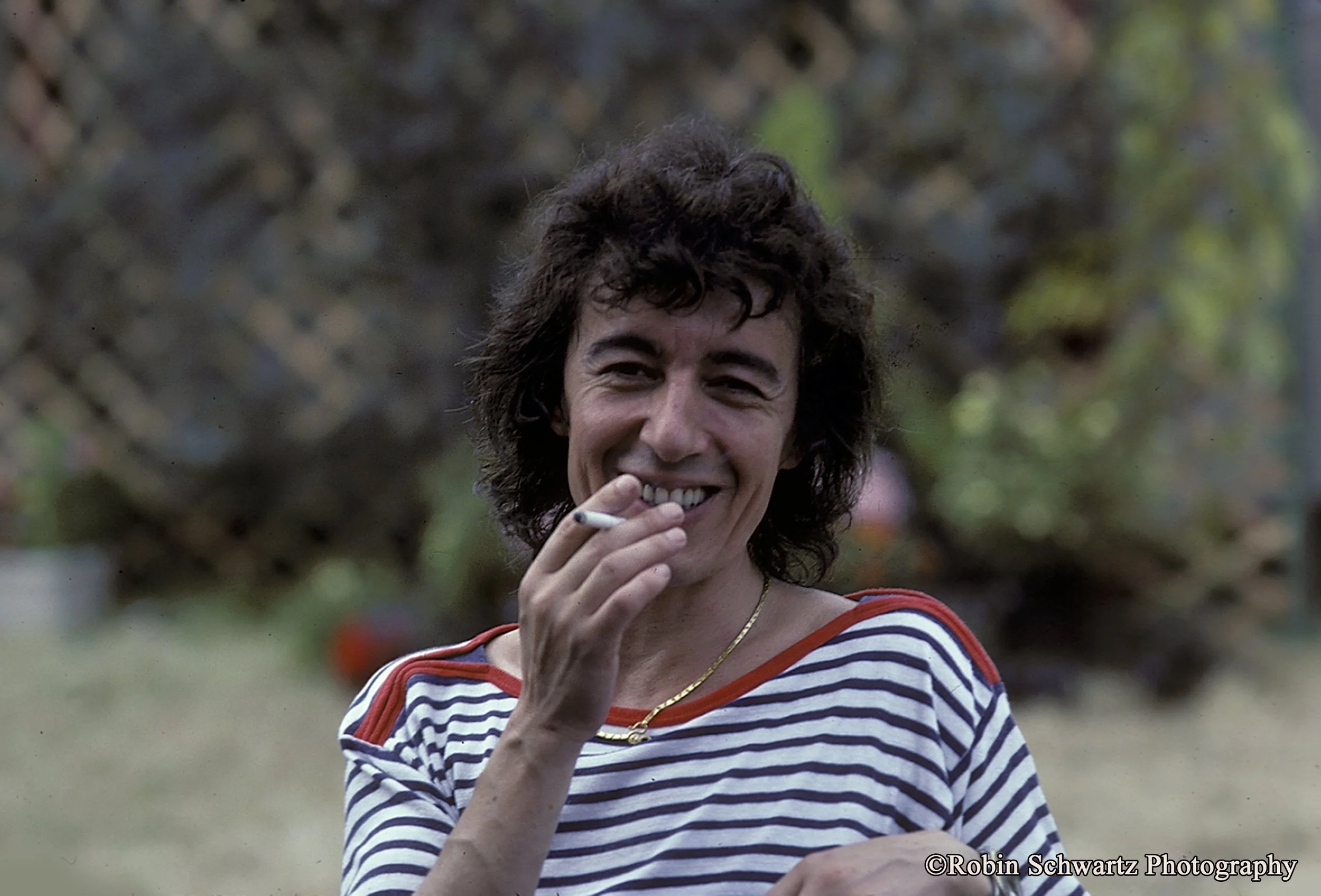 Bill Wyman with cigarette backstagepg.jpg
