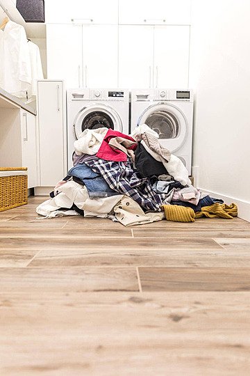 pngtree-pile-of-dirty-clothes-in-laundry-room-assorted-home-lifestyle-photo-image_39091200.jpg