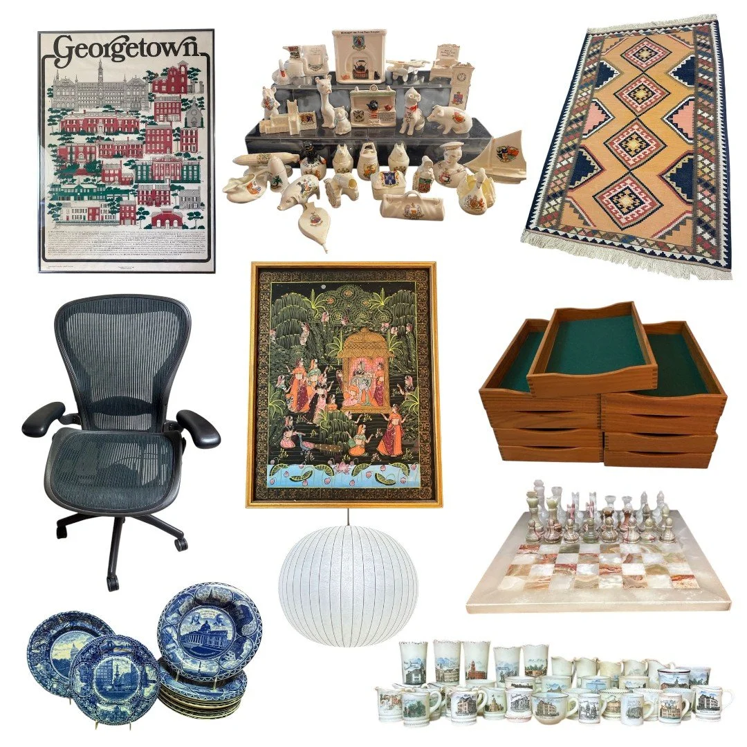 Collection of various decorative and household items, including a Georgetown poster, a model village, a patterned rug, a black office chair, an embroidered picture, wooden trays, a chess set, a hanging paper lantern, a set of blue and white plates, and a collection of mugs with cityscape images.
