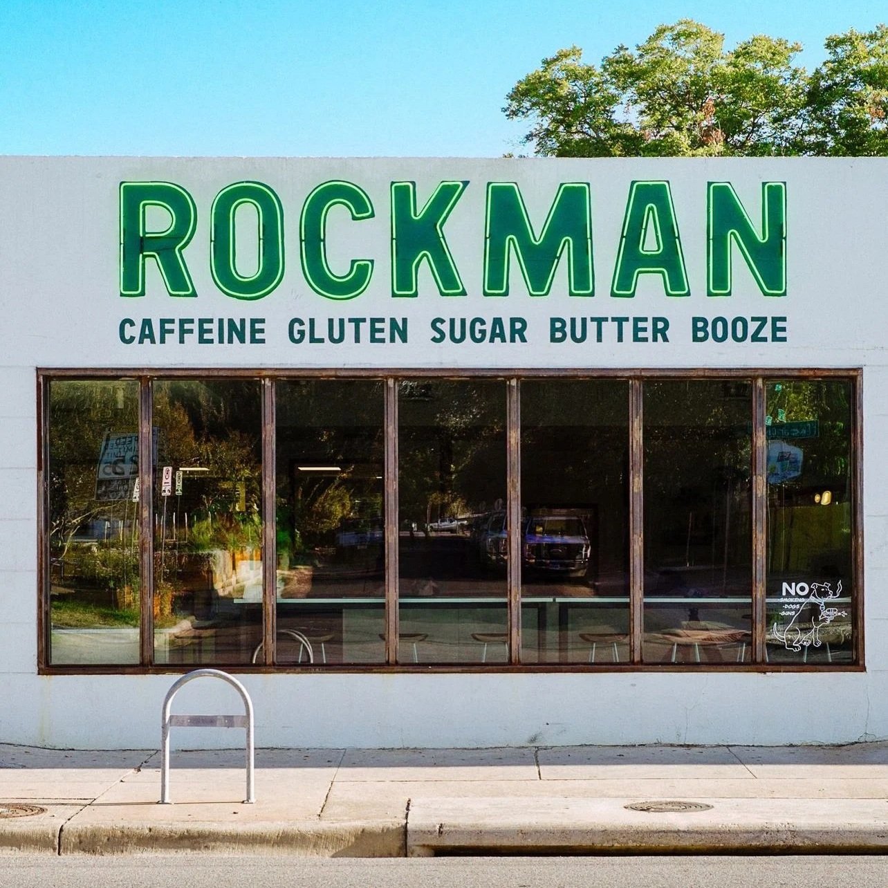 Rockman logo and wayfinding design. Neon and painting installation by Bickerstaff Signs-Austin, Texas.