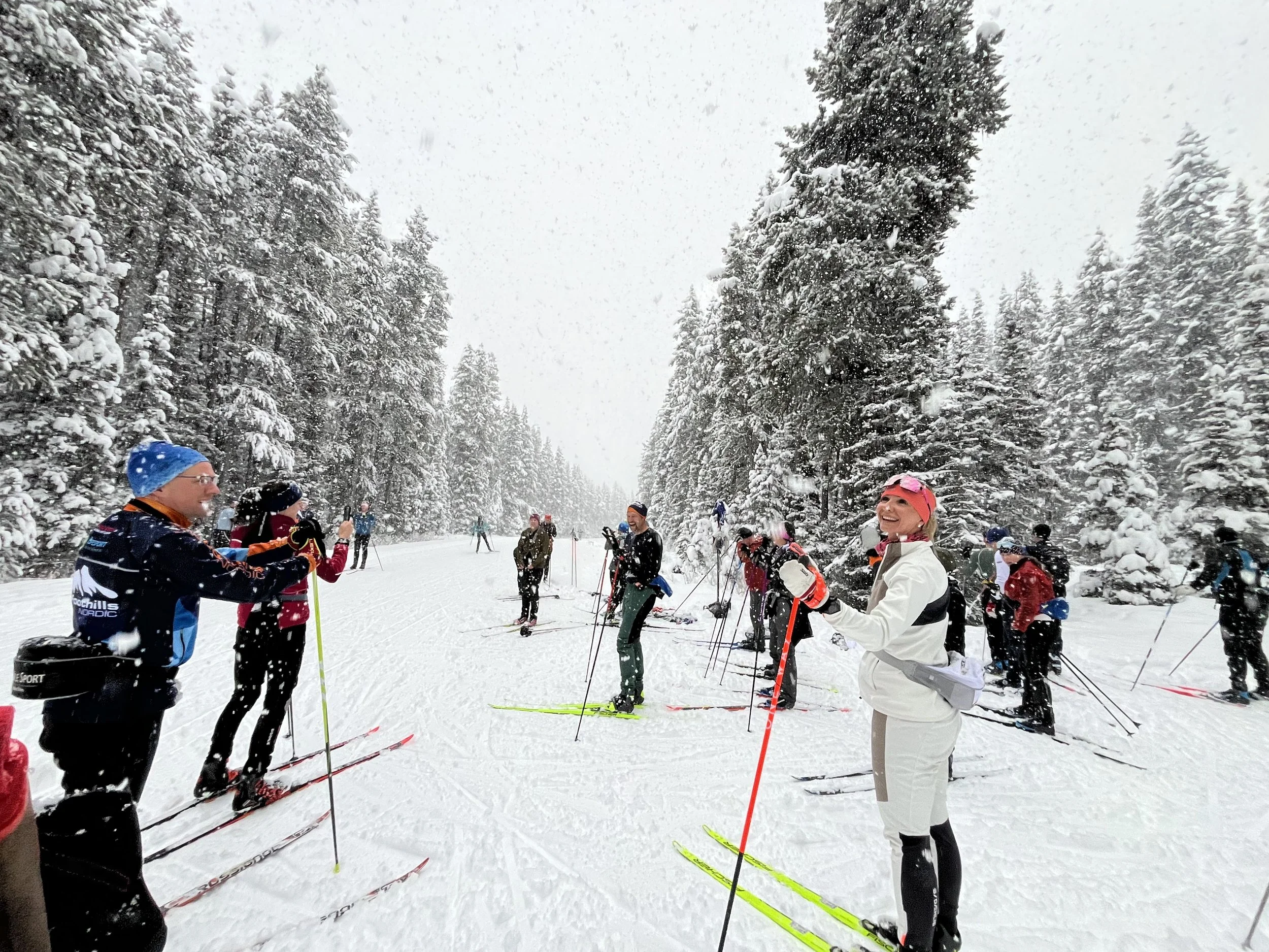 Cross country skiers in the falluing snow