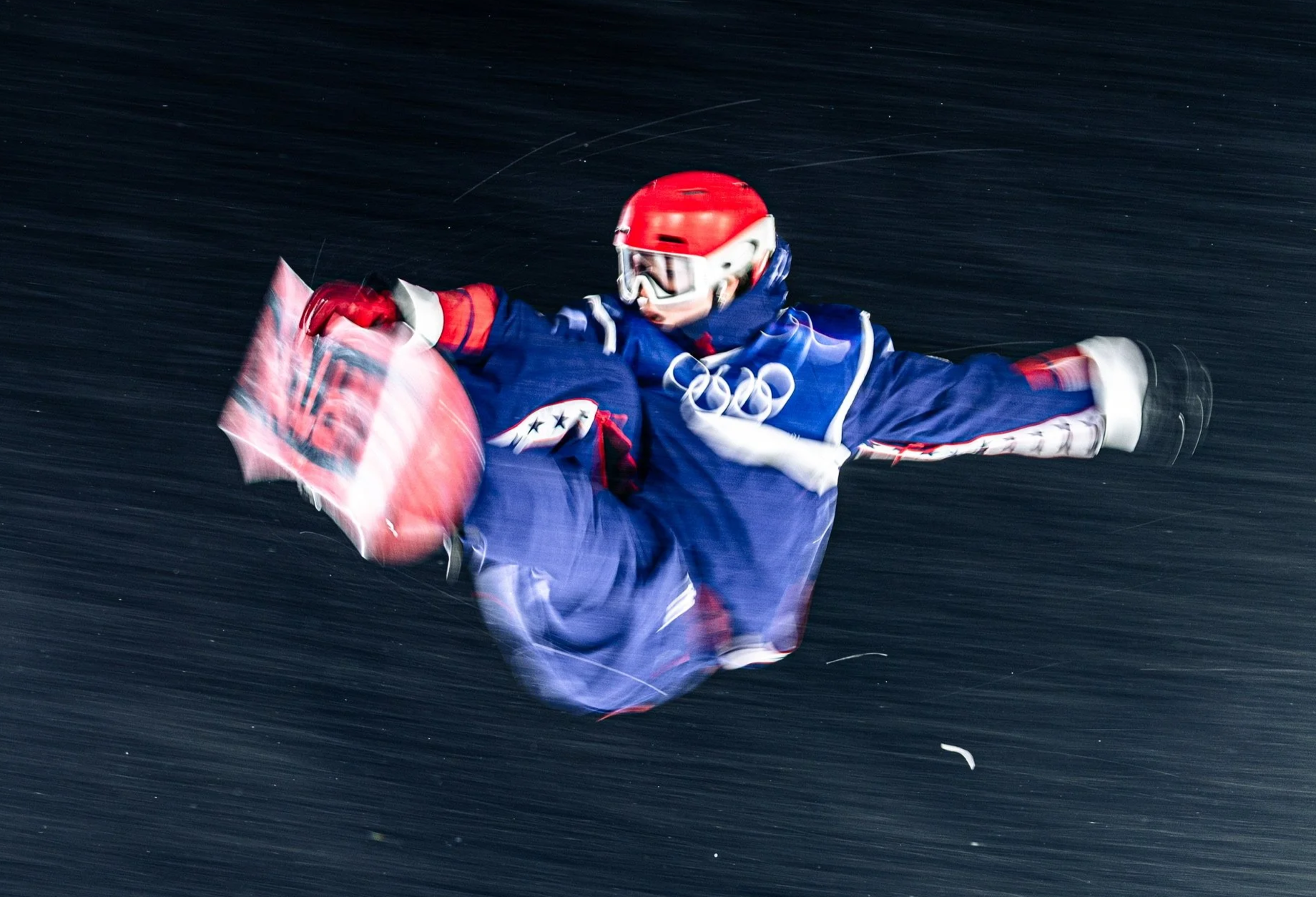 Olympic Snowboarder Hahna Norman big air board grab