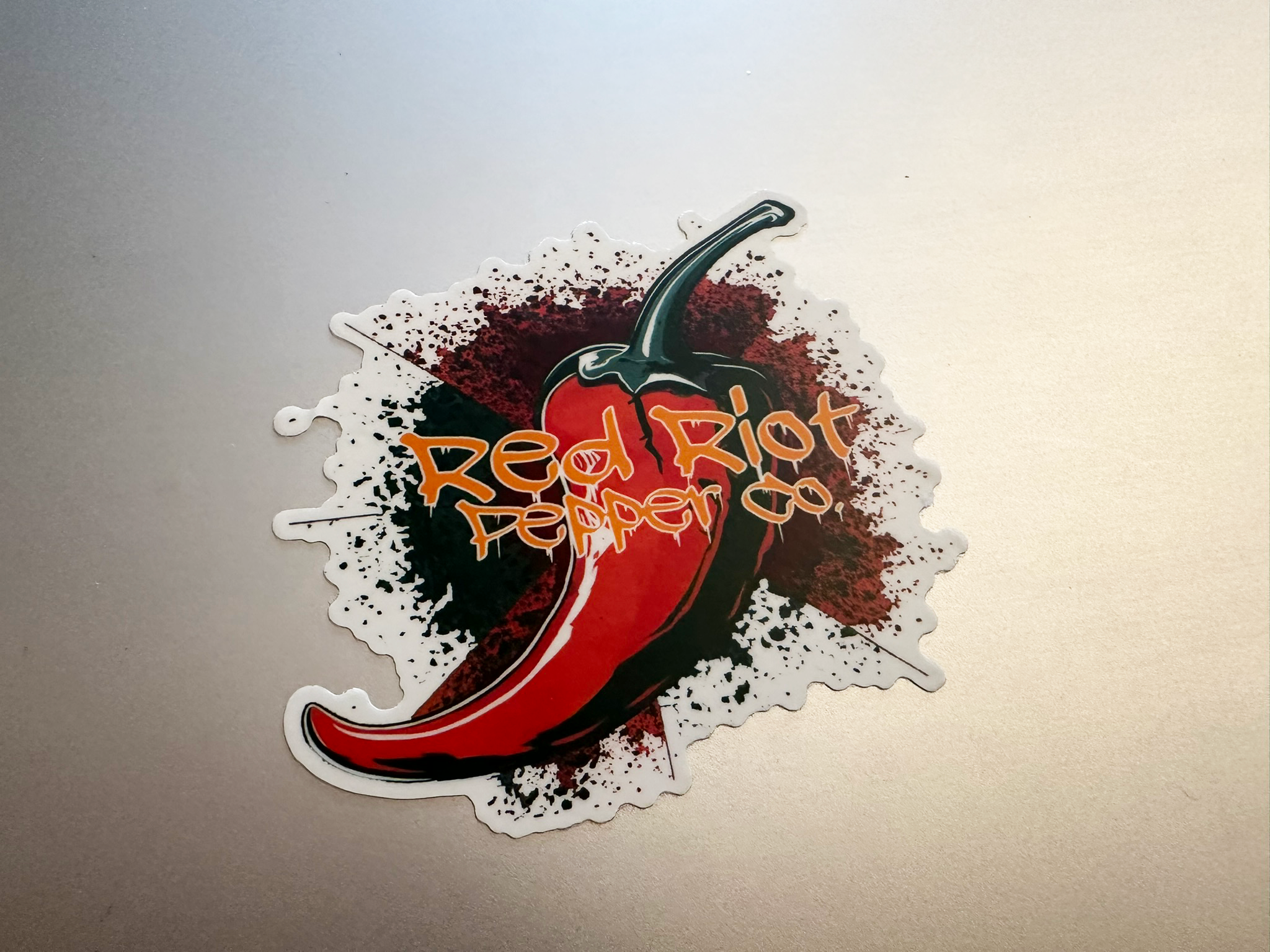 Red Riot Sticker on silver.png
