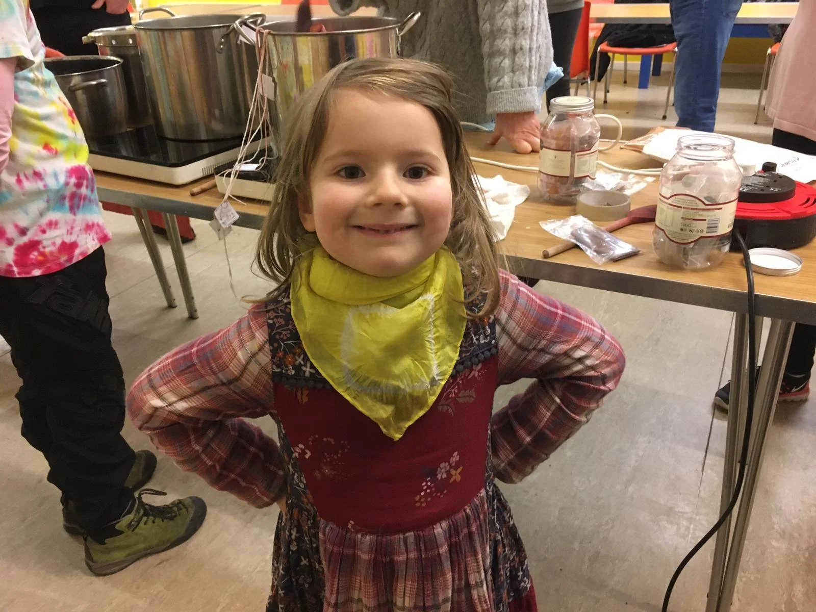 Child showing her scarf.JPG