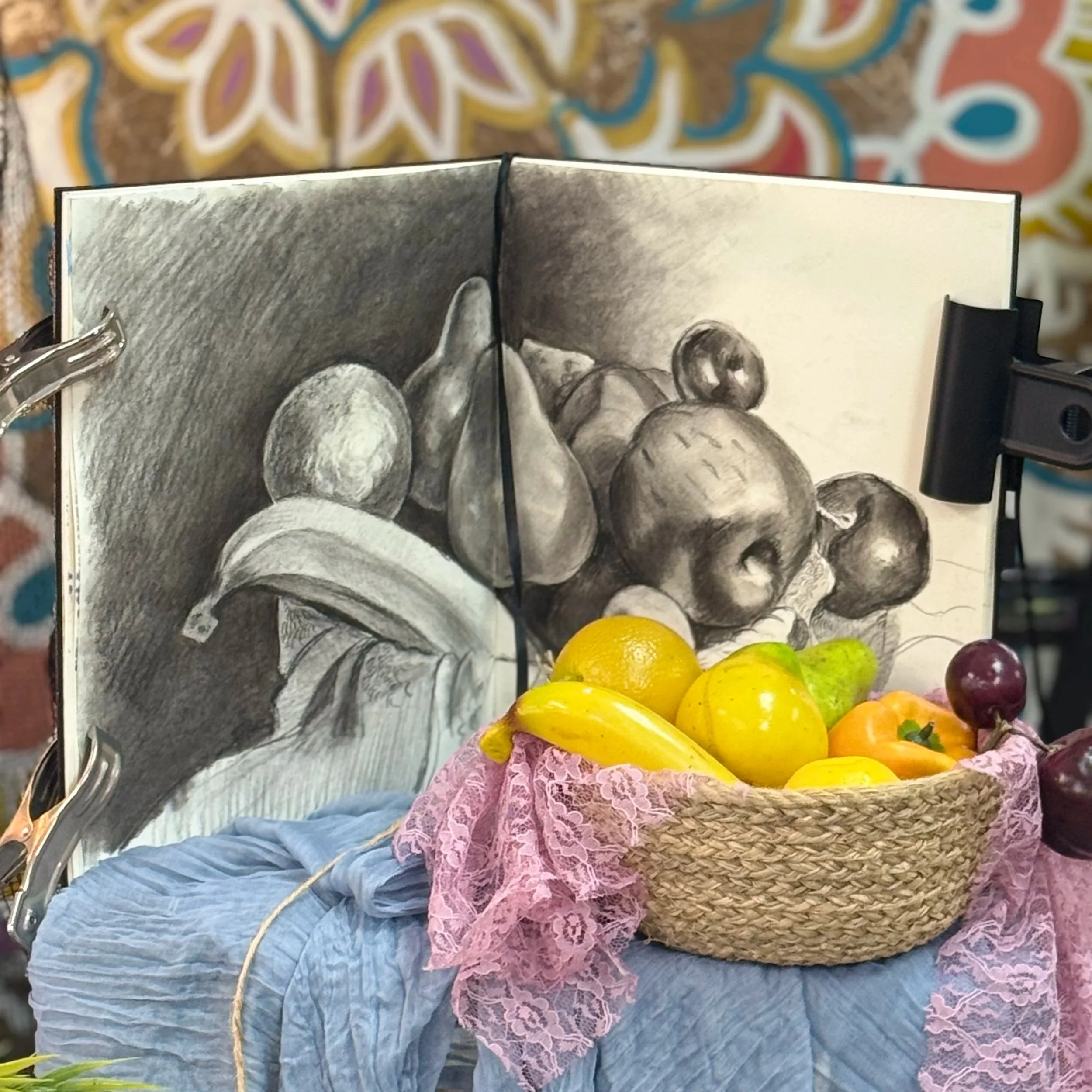 Geometric drawing of an outline square with sections divided by vertical, horizontal, and diagonal lines.