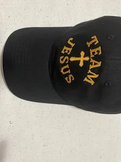 Jesus_Centered_Cross_Black_Cap_Side.jpg