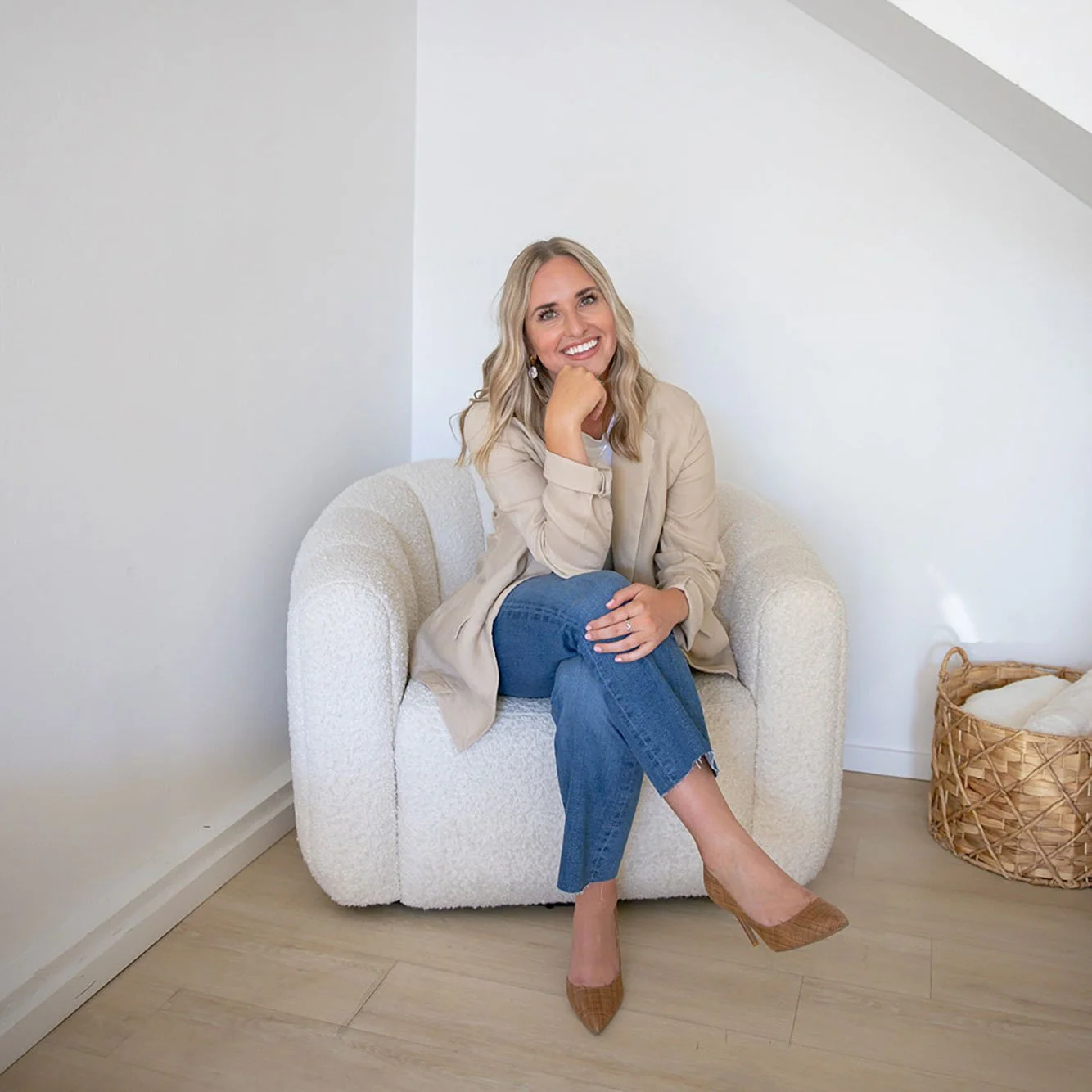 Jaycie, Co-Founder of Ola Marketing Co., smiling confidently in a bright, modern workspace.