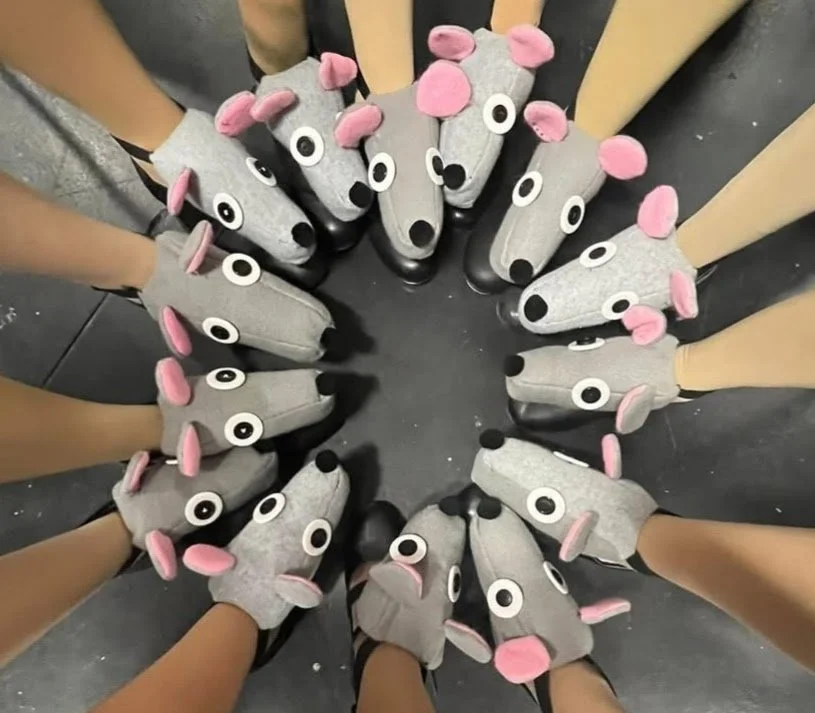 The rat tappers showing off their rats.