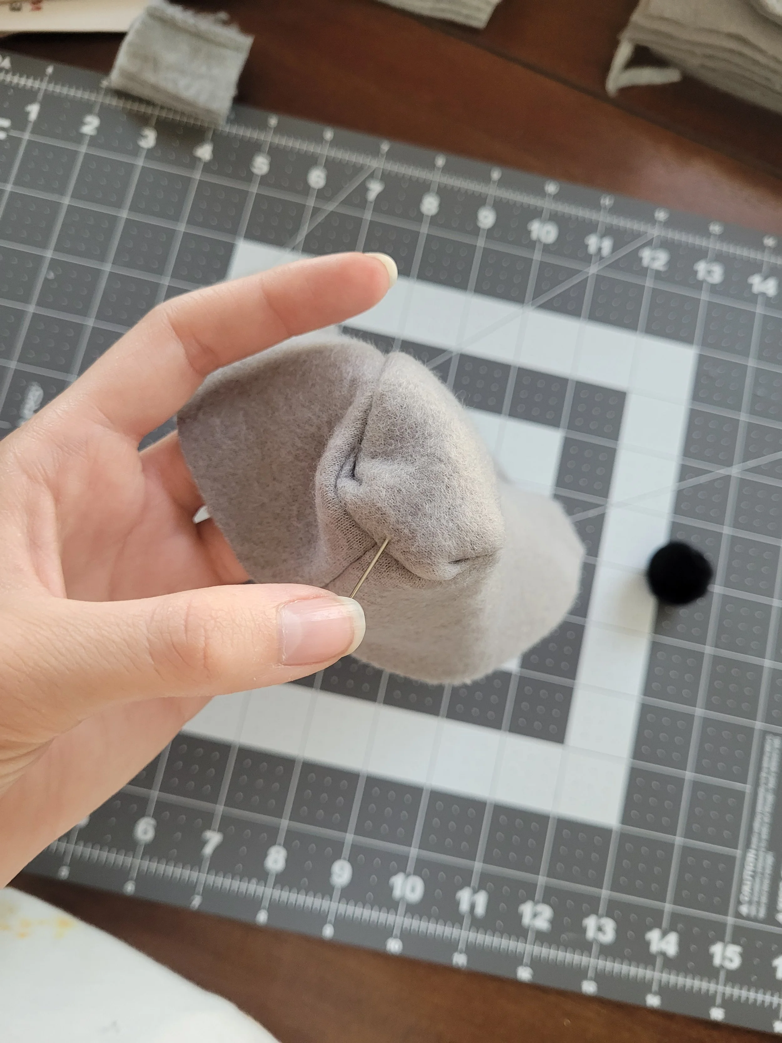 One of a series of images taken as instruction for how to sew the rat bodies together.