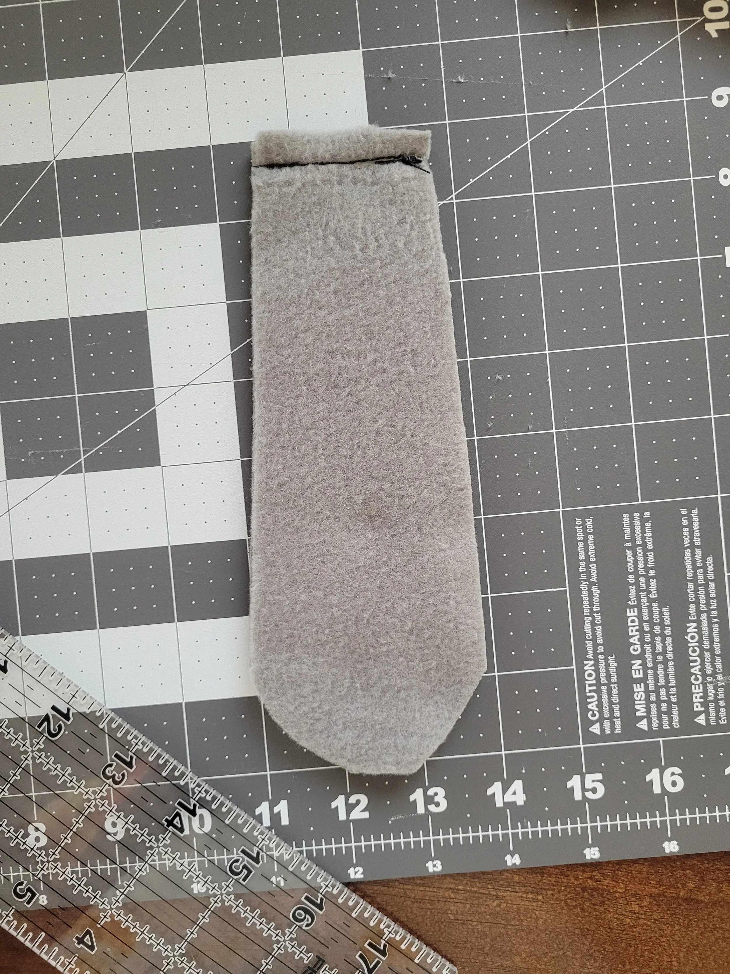 One of a series of images taken as instruction for how to sew the rat bodies together.