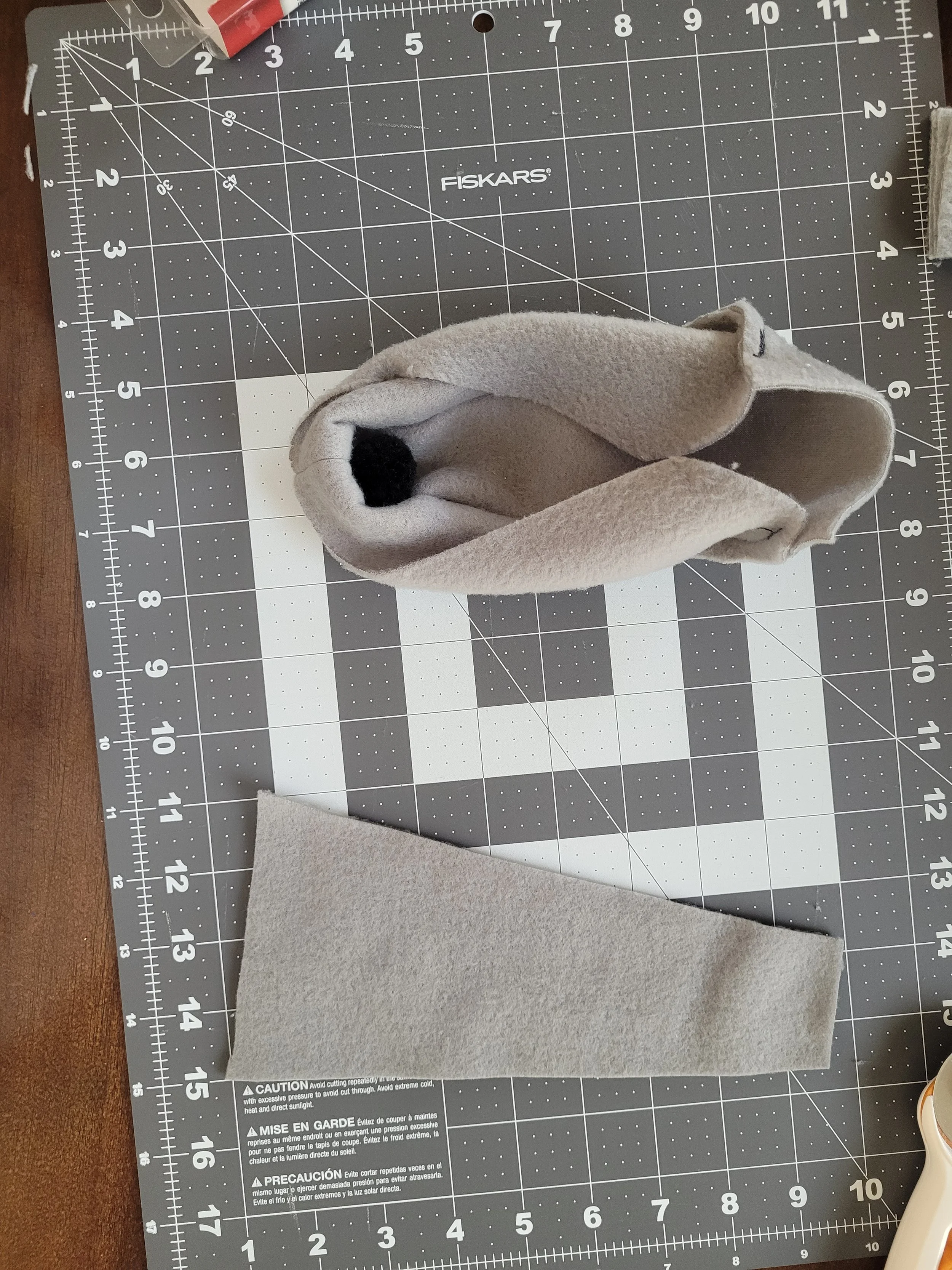 One of a series of images taken as instruction for how to sew the rat bodies together.