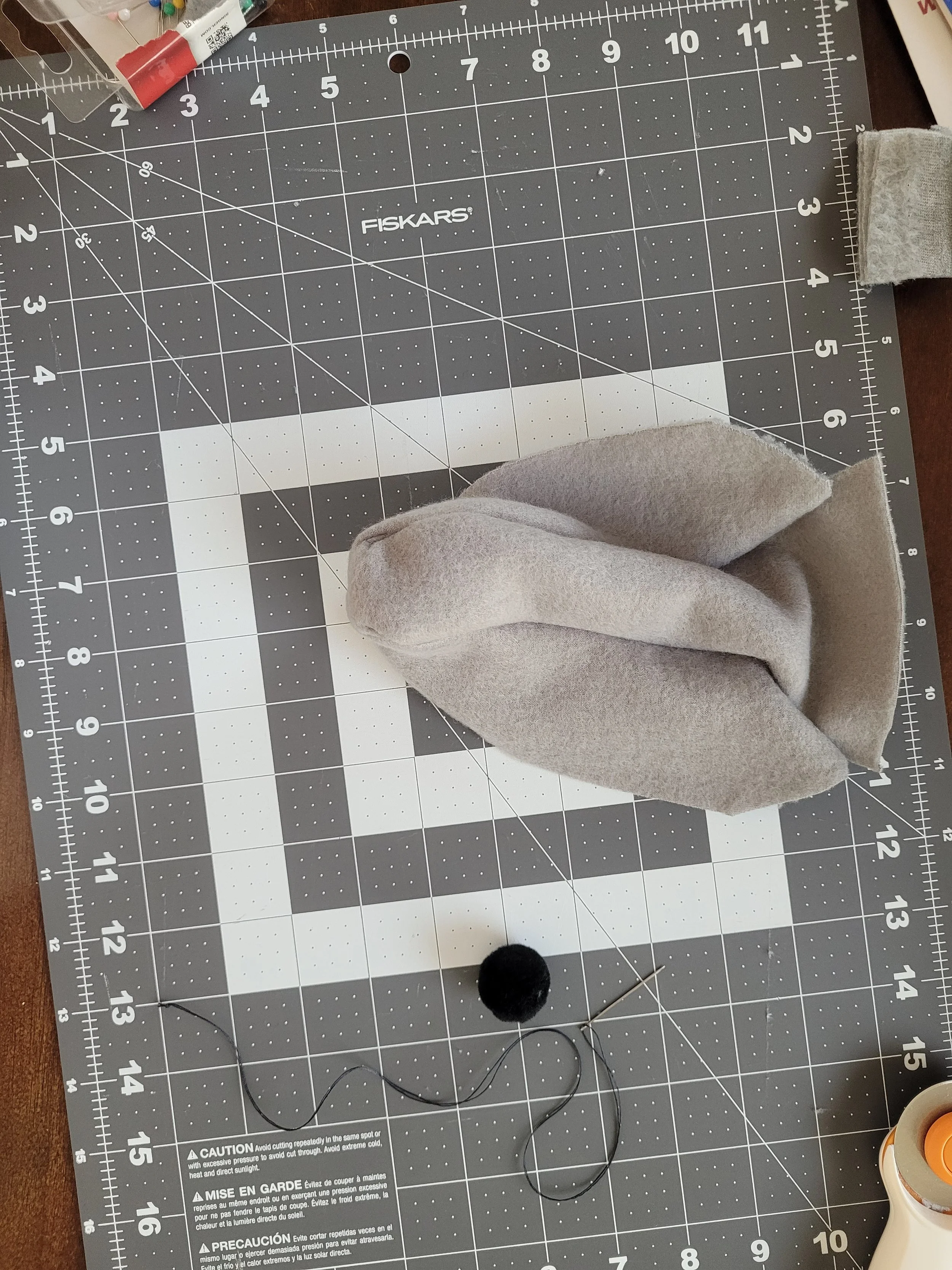 One of a series of images taken as instruction for how to sew the rat bodies together.