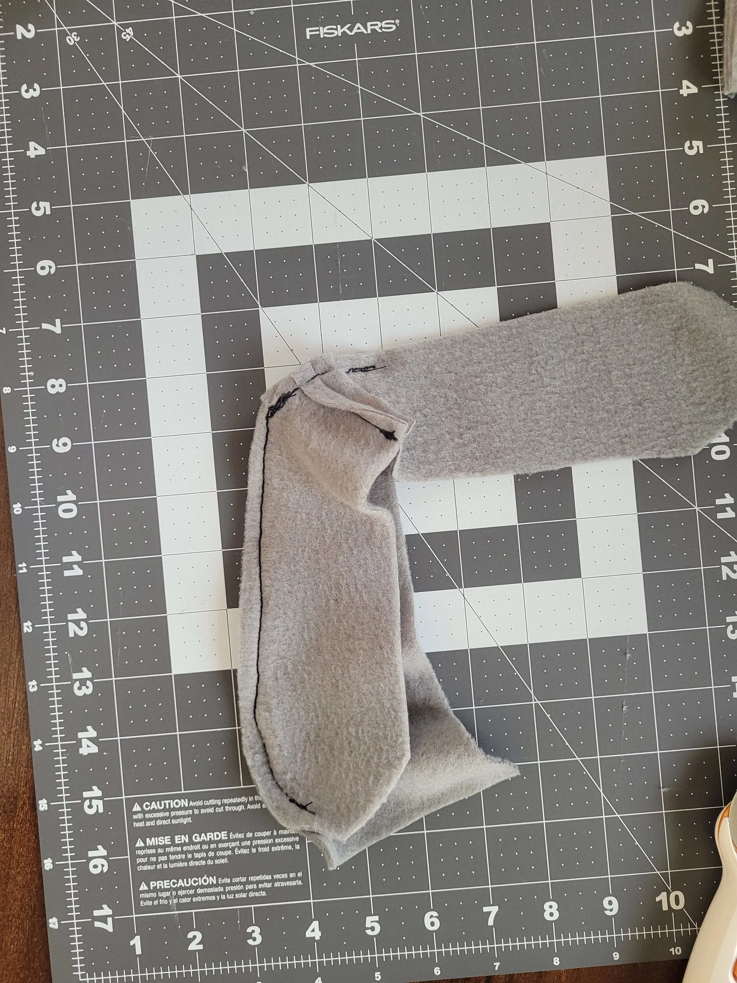One of a series of images taken as instruction for how to sew the rat bodies together.