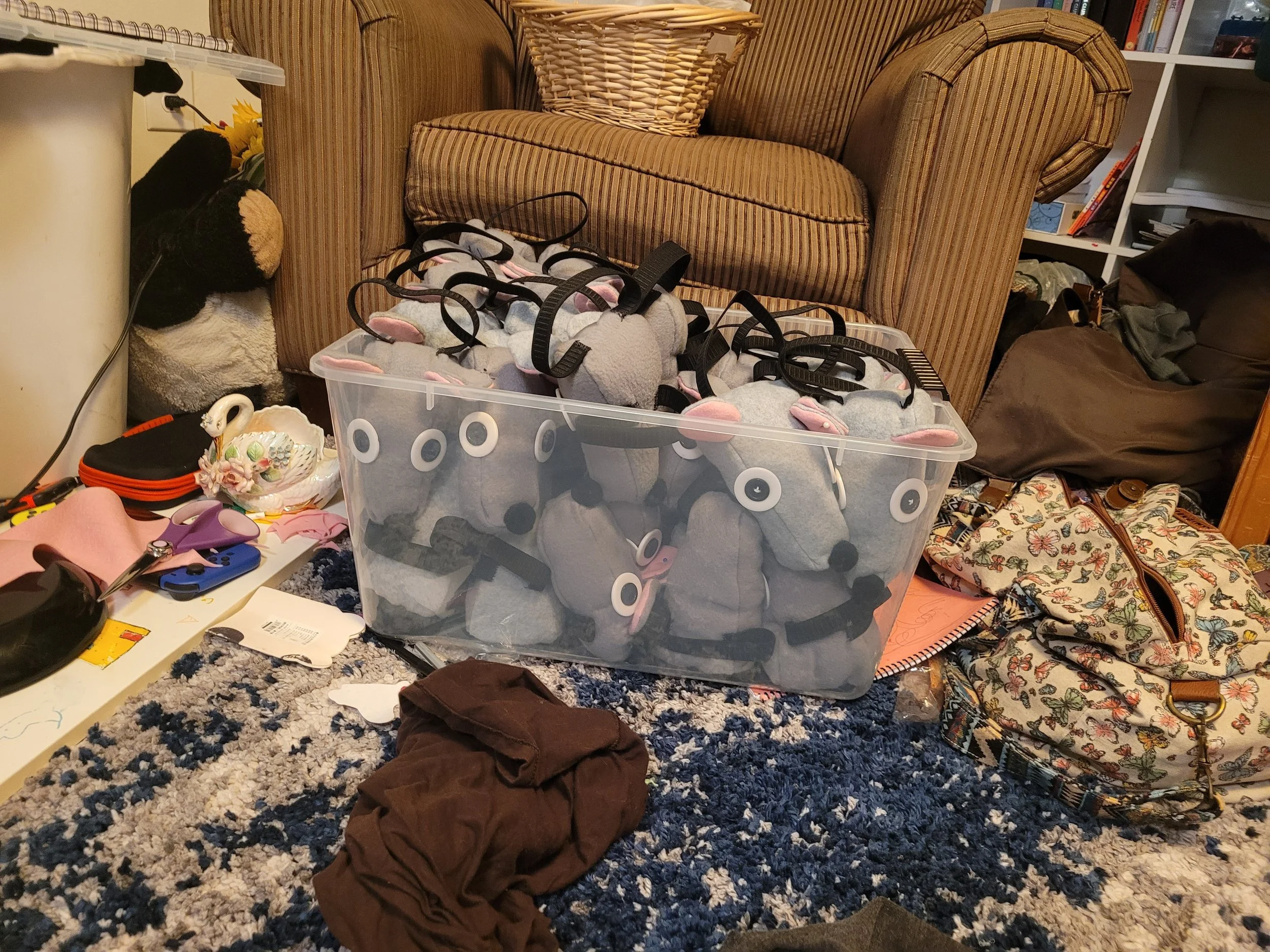 Final photo for progress on the number of rats constructed, showing all the rats finished and packed to go to the theater.