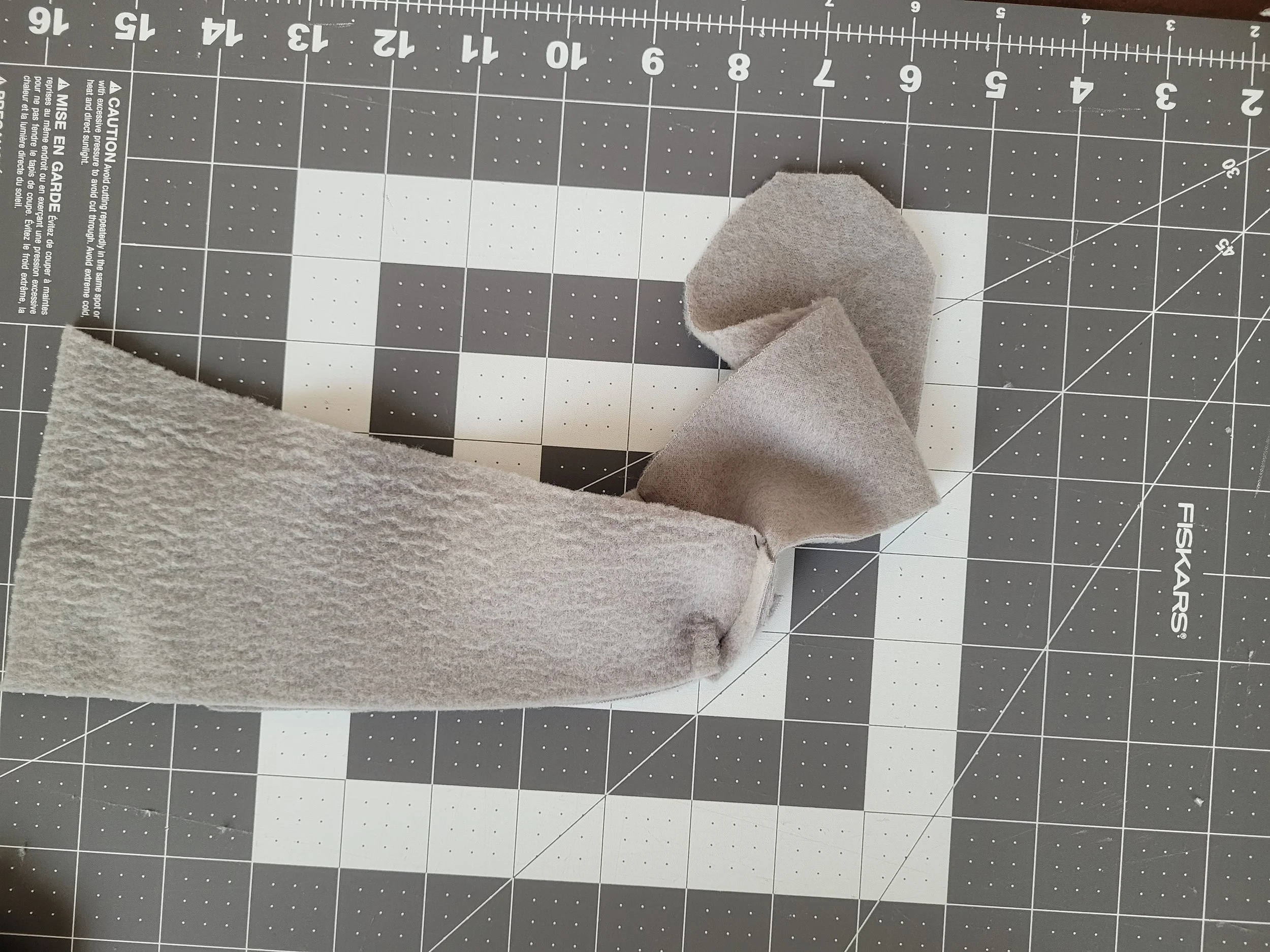 One of a series of images taken as instruction for how to sew the rat bodies together.