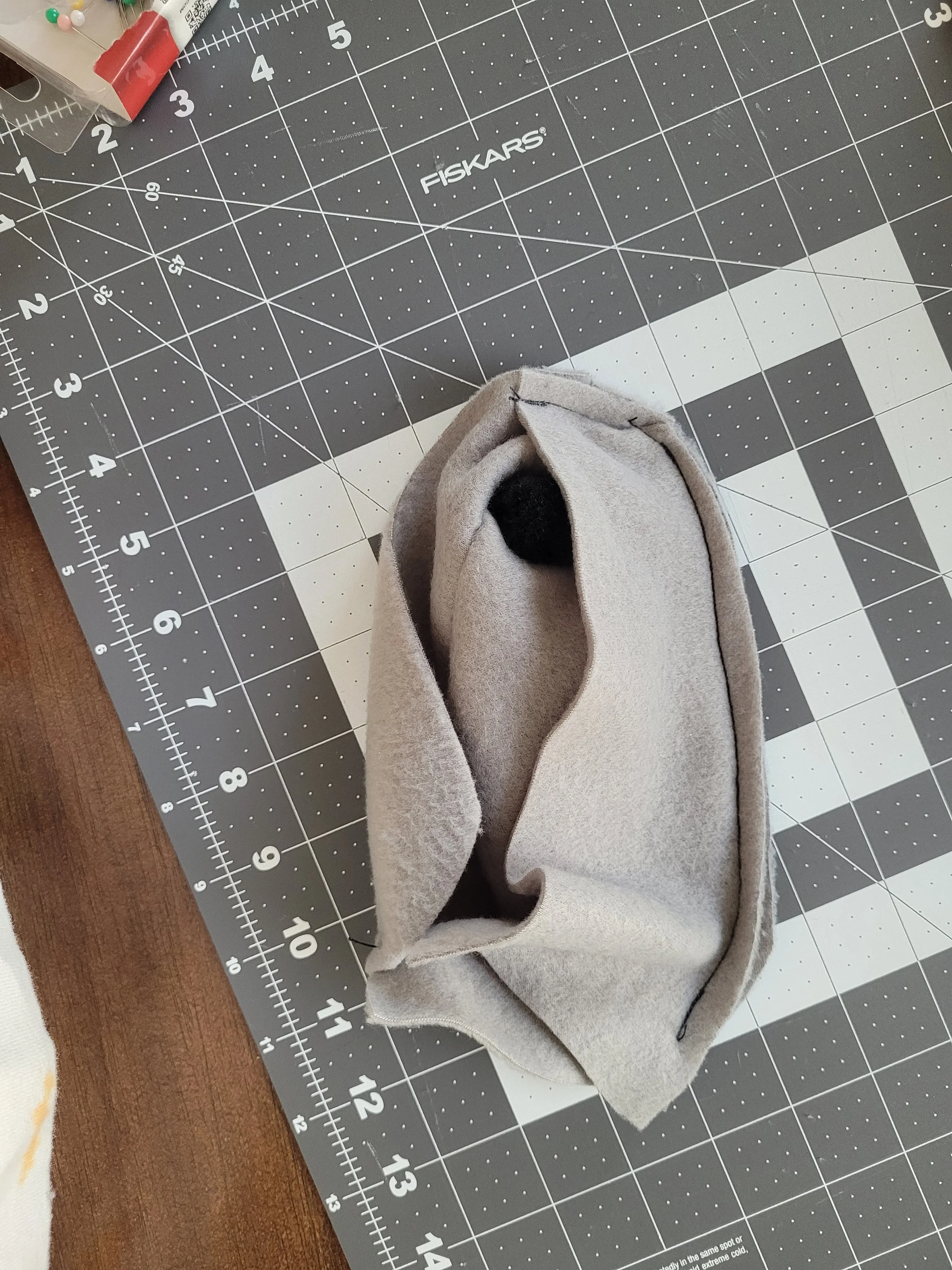 One of a series of images taken as instruction for how to sew the rat bodies together.