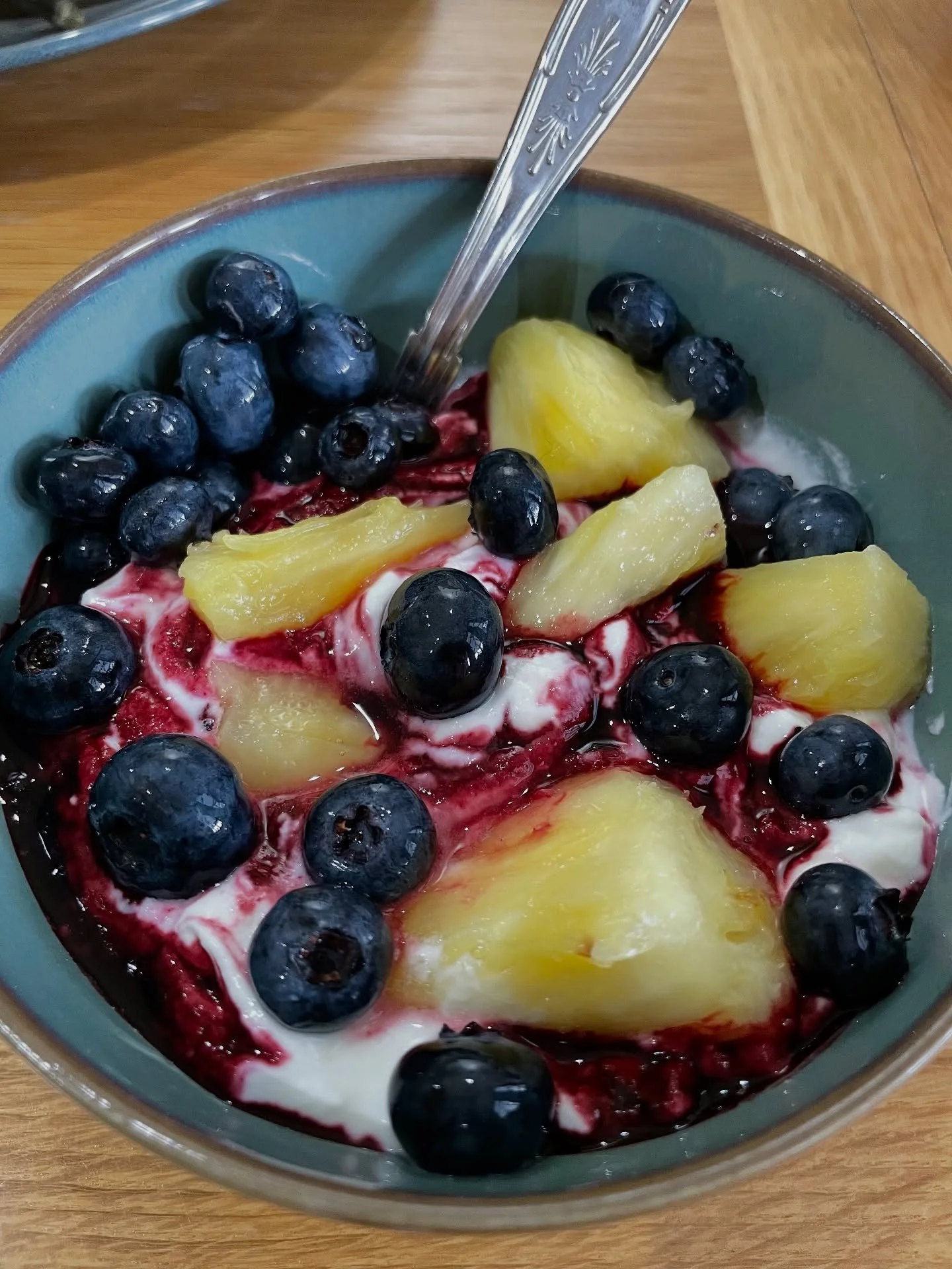 Breakfast! Organic Greek natural yogurt, a spoon of homemade elderberry syrup swirled in, topped with pineapple and blueberries 🍍 🫐 
#breakfast #healthybreakfastideas #naturalyoghurt #blueberries #pineapple #healthcoachlife #elderberrysyrup
