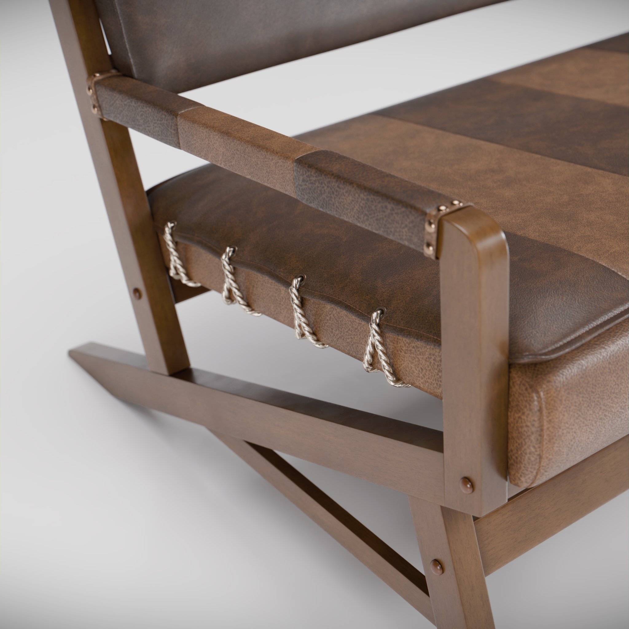 Closeup view of a leather & wood sofa