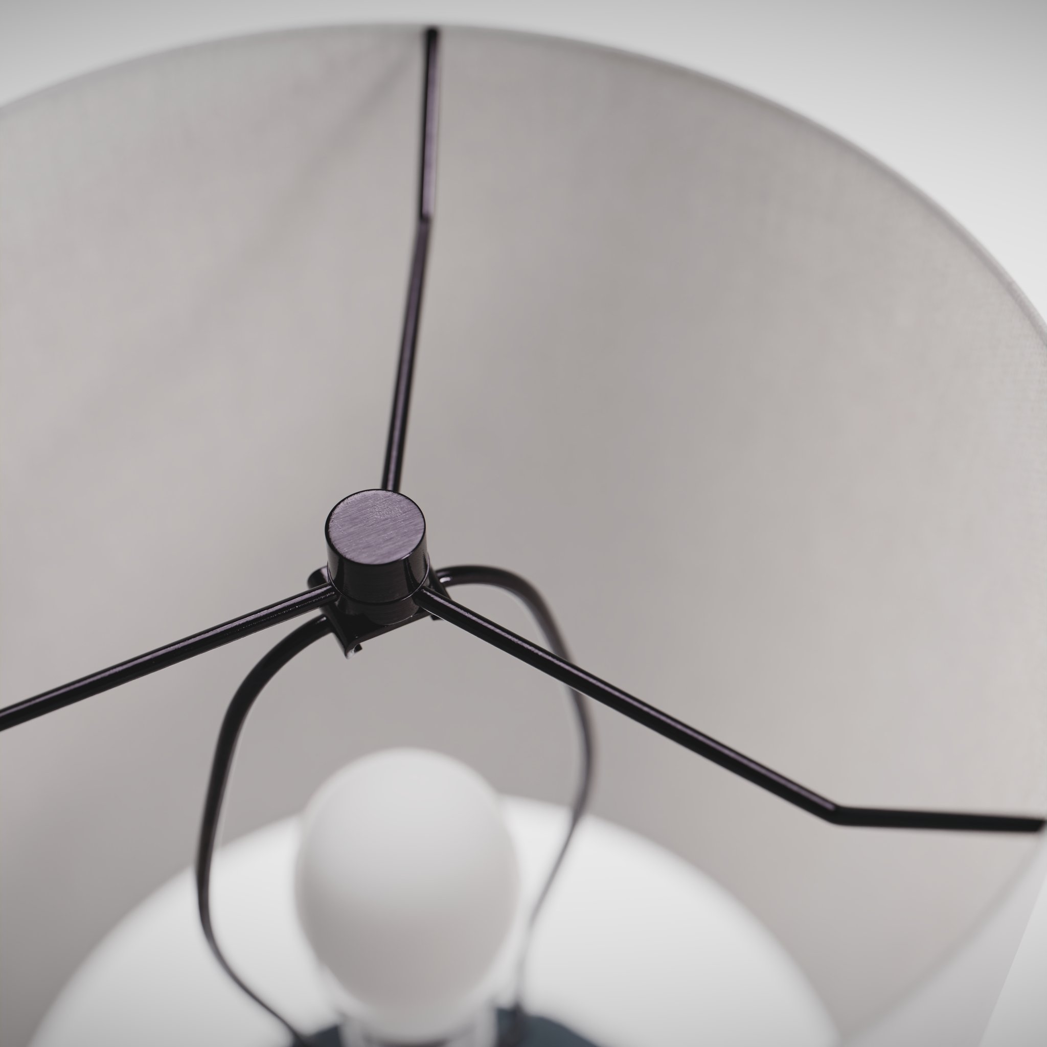 closeup view of a modern type of table lamp in a white studio