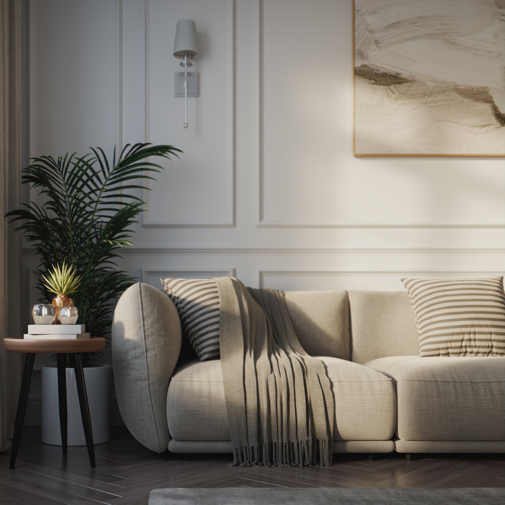 Partial view of a sofa with an end table to the left and an interior plan behind it.