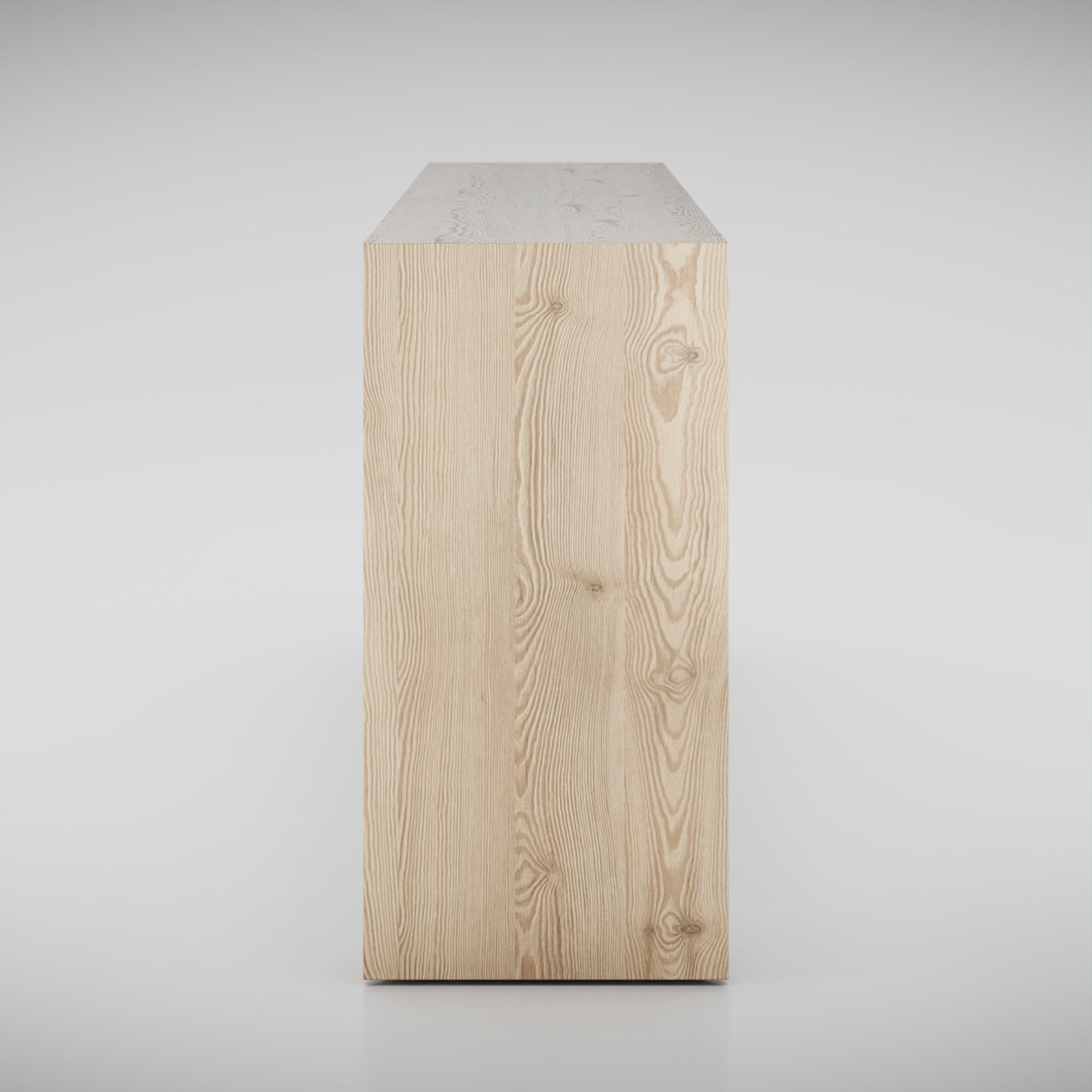 side view of a wooden console table standing in a white studio environment