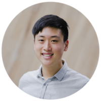 Alan chen headshot. Cream coloured wall in background with texture