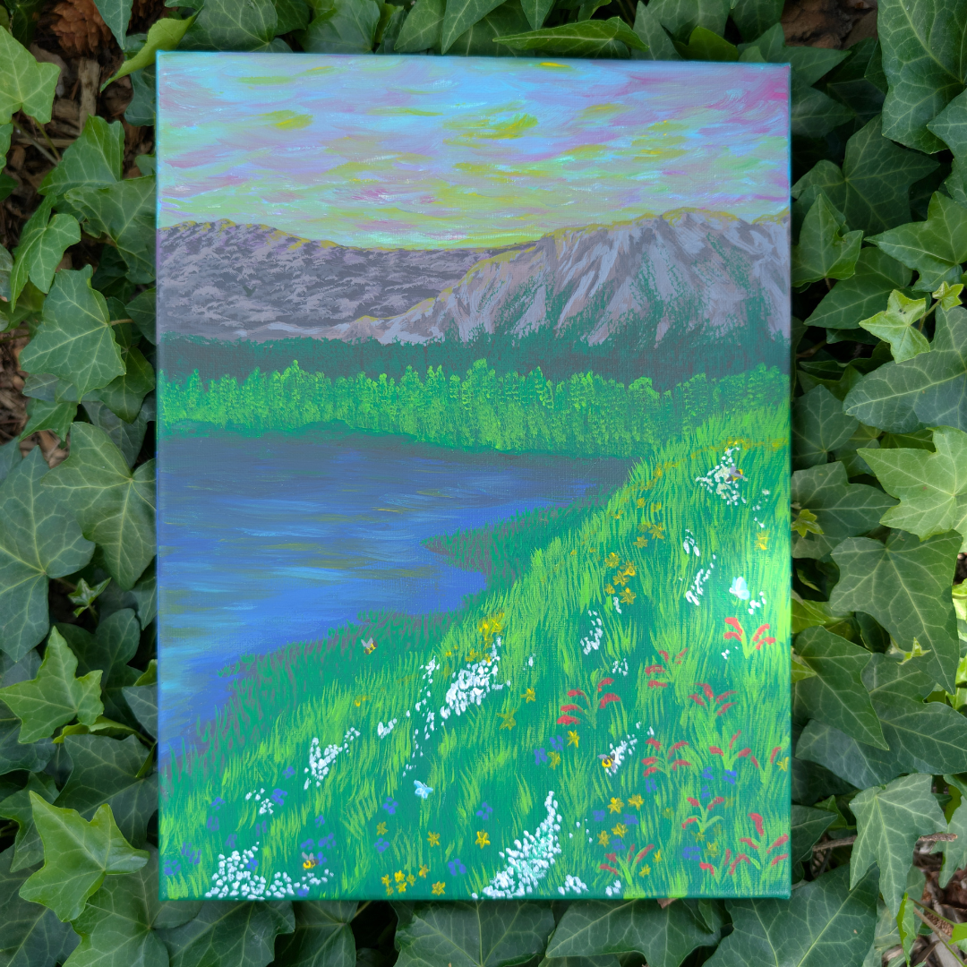 Painting of a landscape featuring mountains, a lake, green trees, and a grassy field with wildflowers, set against a colorful sky.