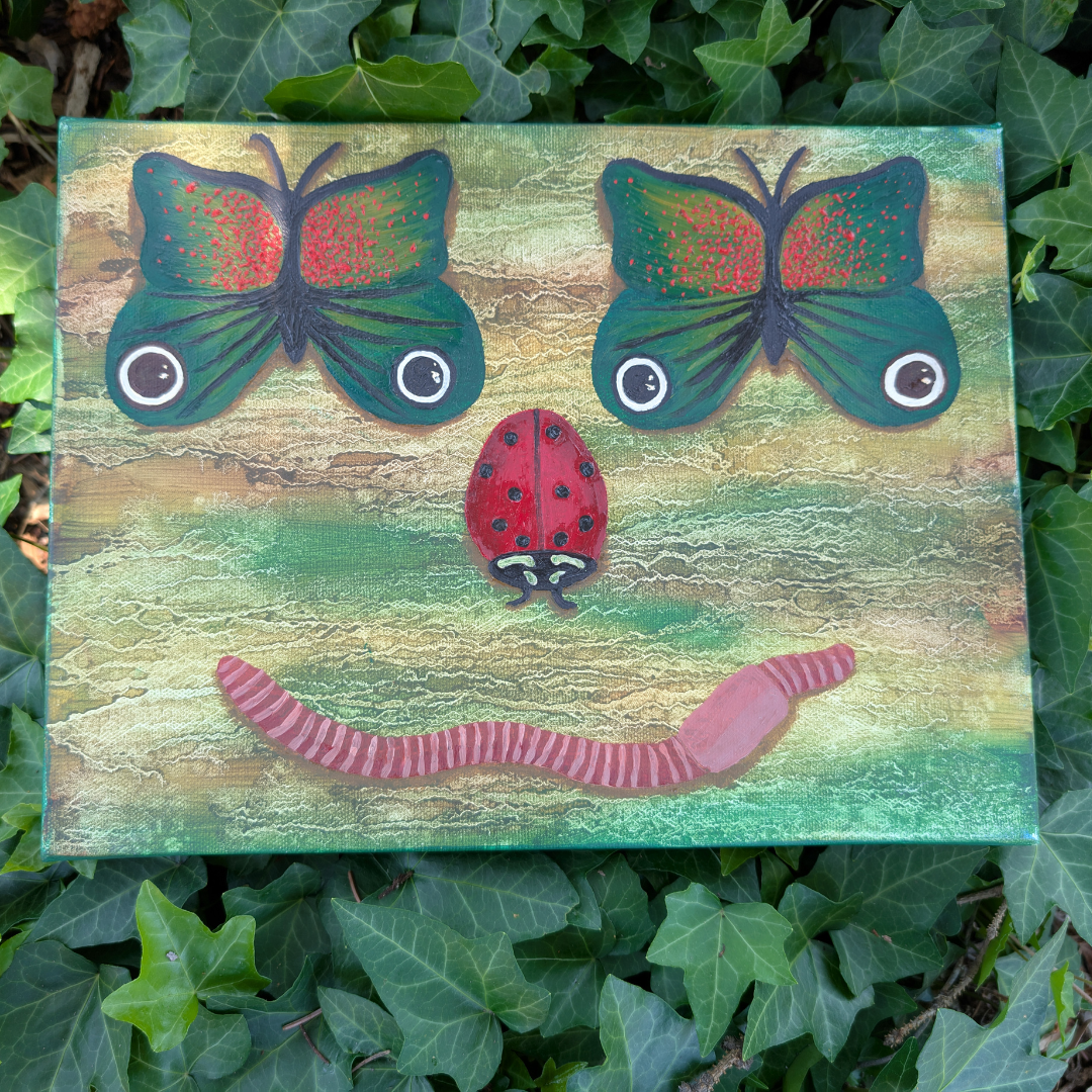 A painted artwork of a face made from insects and animals. The eyes are represented by two green butterflies with red spots and black outlines, the nose by a red ladybug with black spots, and the mouth by a pink and white striped worm. The background
