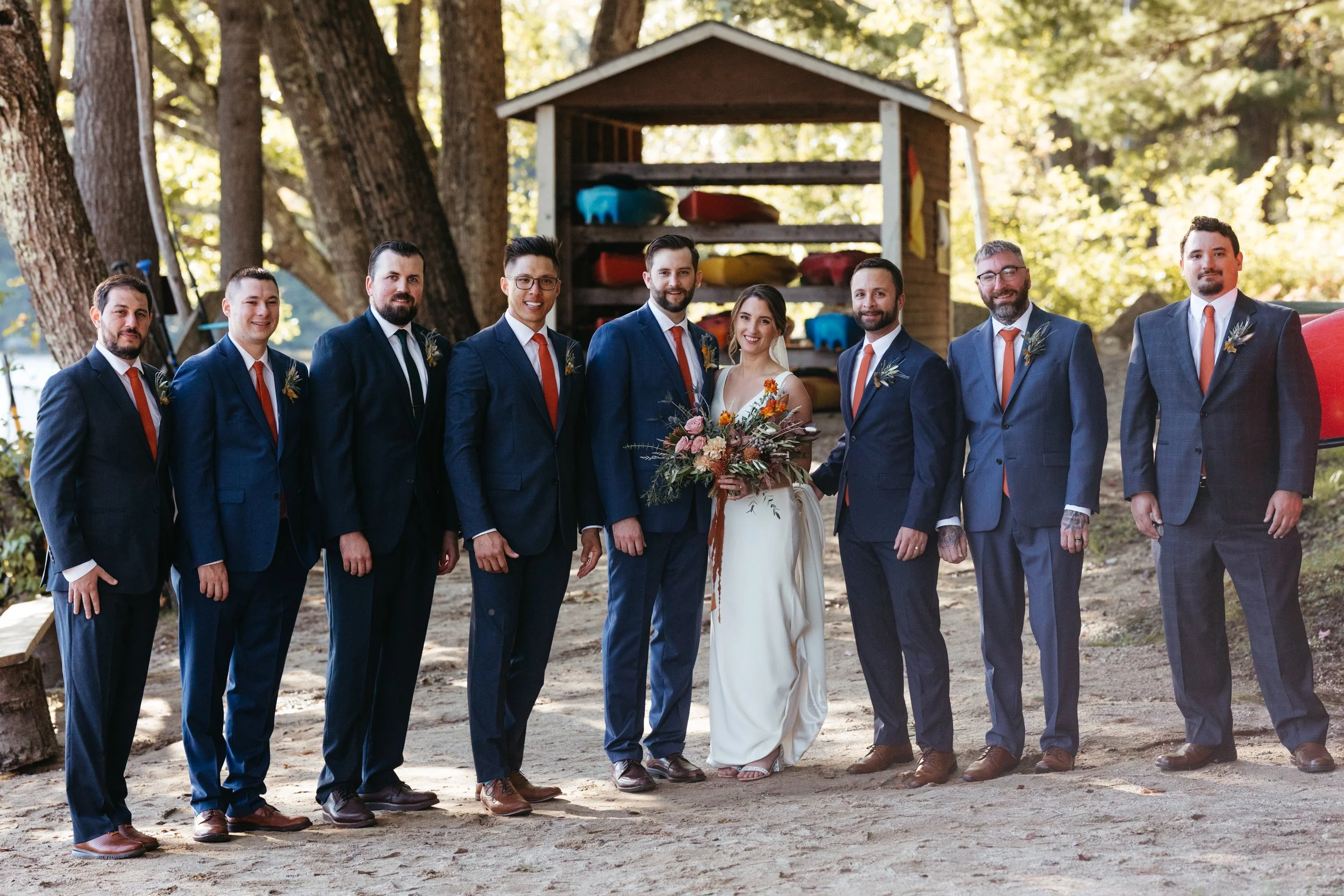 wedding party at lake in NH, navy suits, orange ties