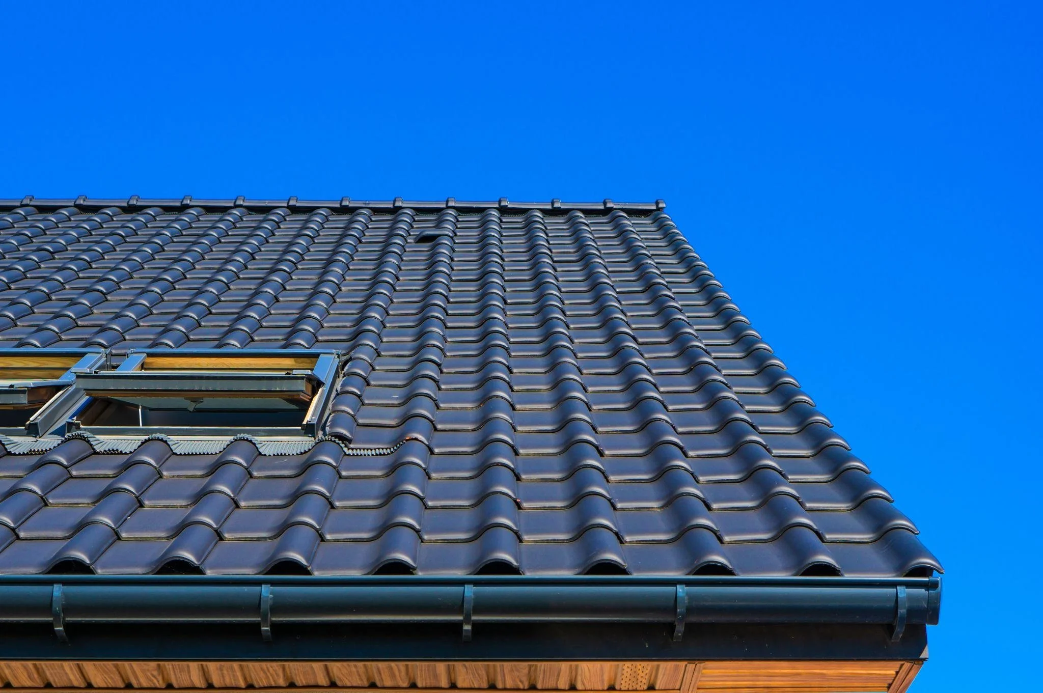 Metal vs Tile Roof Restorations Brisbane 2026
