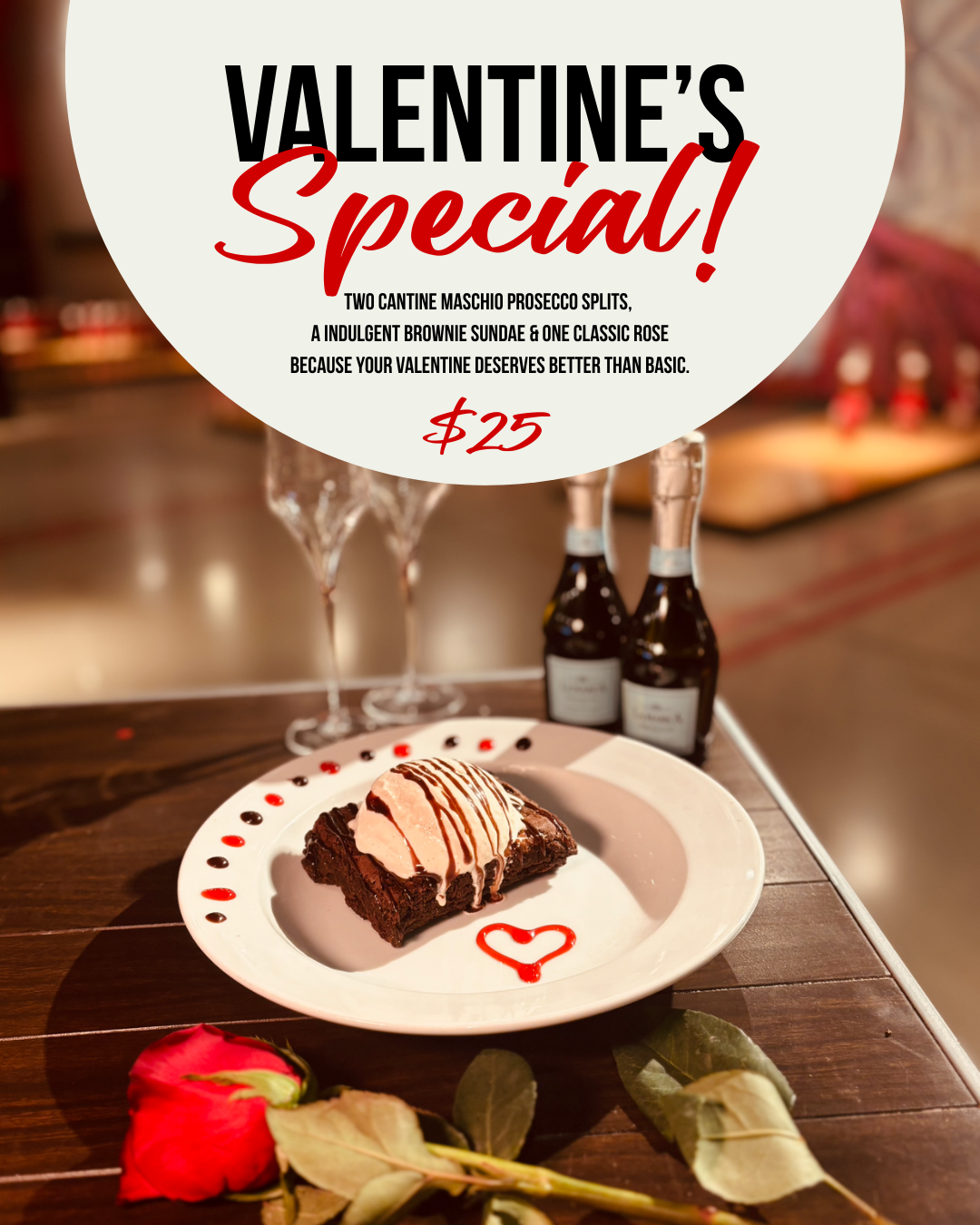 Valentine's Day special offer with two prosecco splits, a brownie sundae, and a rose for $25. The image shows a brownie topped with ice cream and chocolate drizzle, surrounded by heart-shaped and dot-shaped red and black sauces on a plate, with two bottles of prosecco, and two empty glasses in the background.