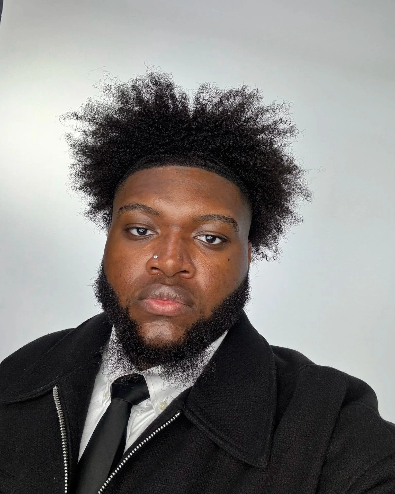 Headshot of Justice Weke, counselor at The Inner Compass Collective