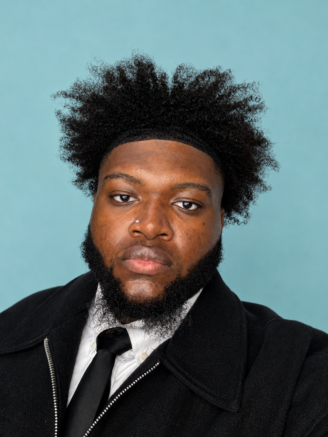 Headshot of Justice Weke, counselor with The Inner Compass Collective
