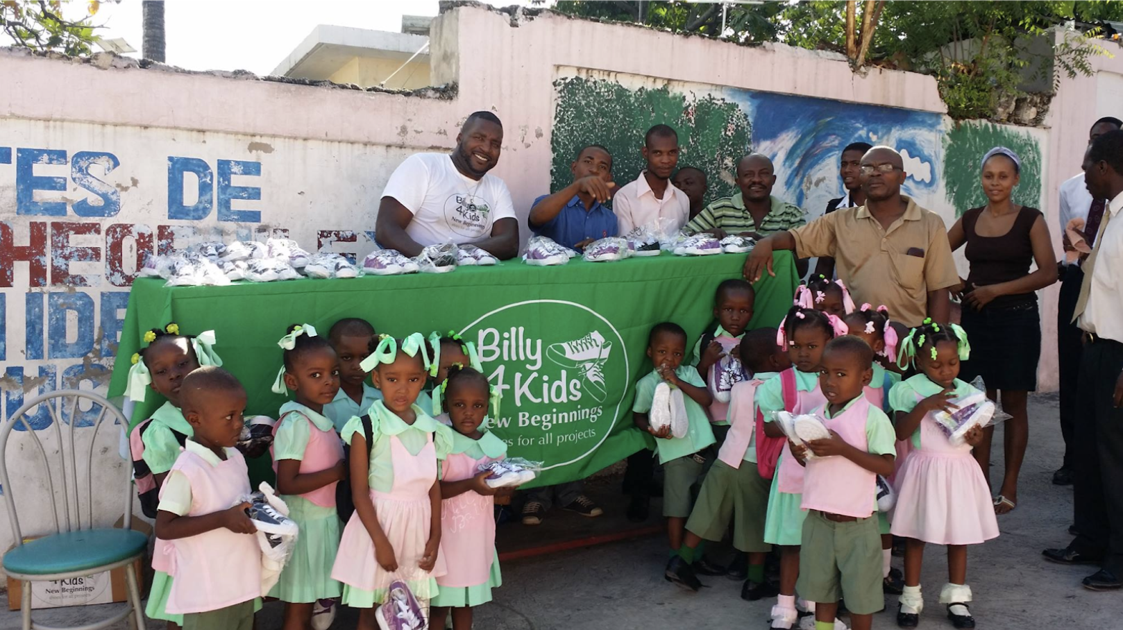 Children in Haiti receiving shoes from Billy4Kids foundation. Billy Lerner