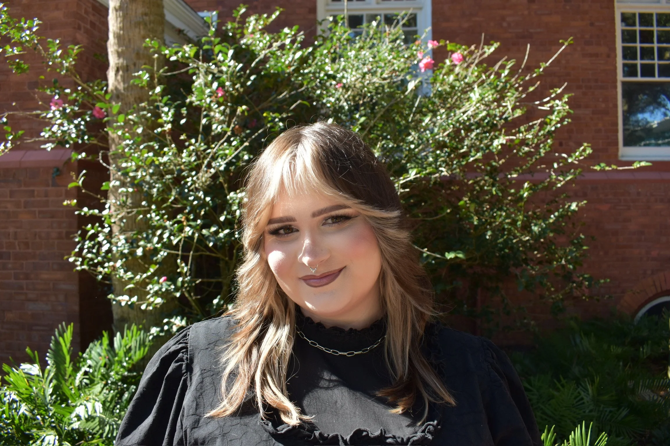 Jolie Molina Maldonado, RMHCI, a White woman with blonde hair, smiles.