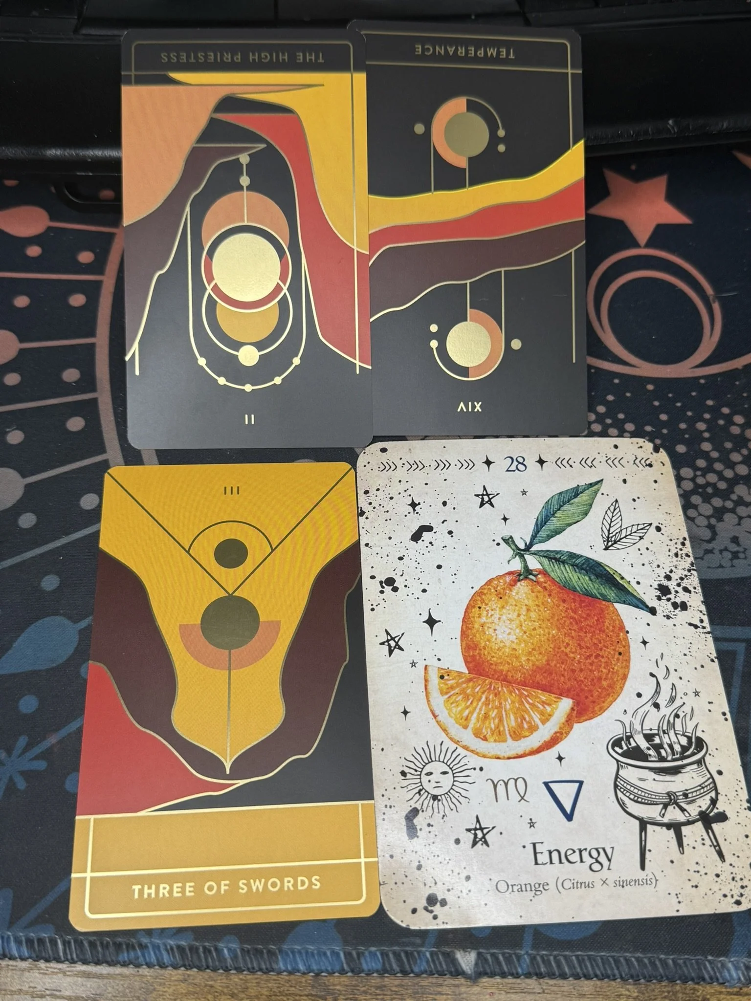 Two rows of two tarot cards