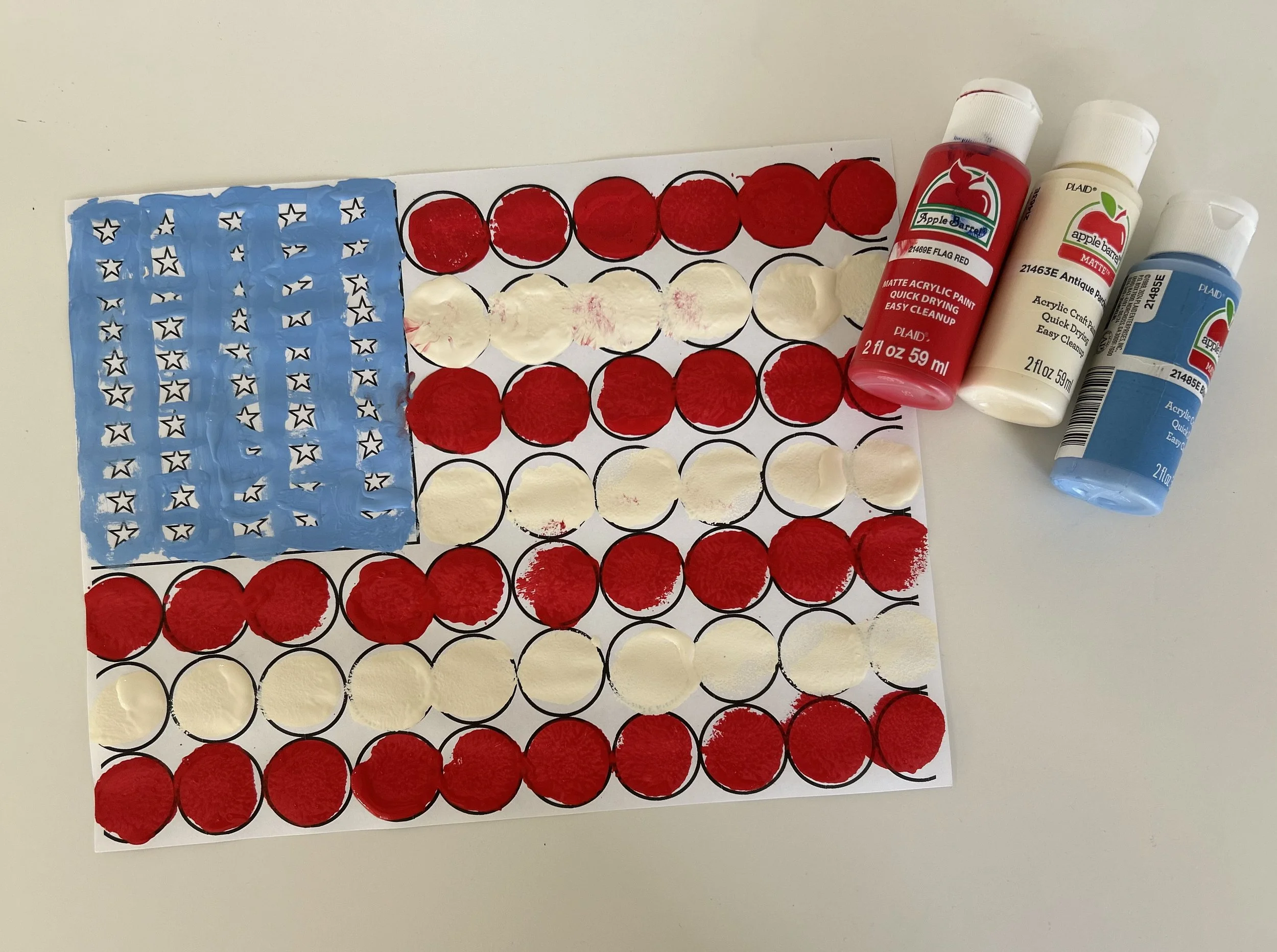 American flag printable activity to enjoy with your children. Using red, white, and blue paint, enjoy a free afternoon activity for a craft or homeschool lesson to help teach your children about the American flag and founding.