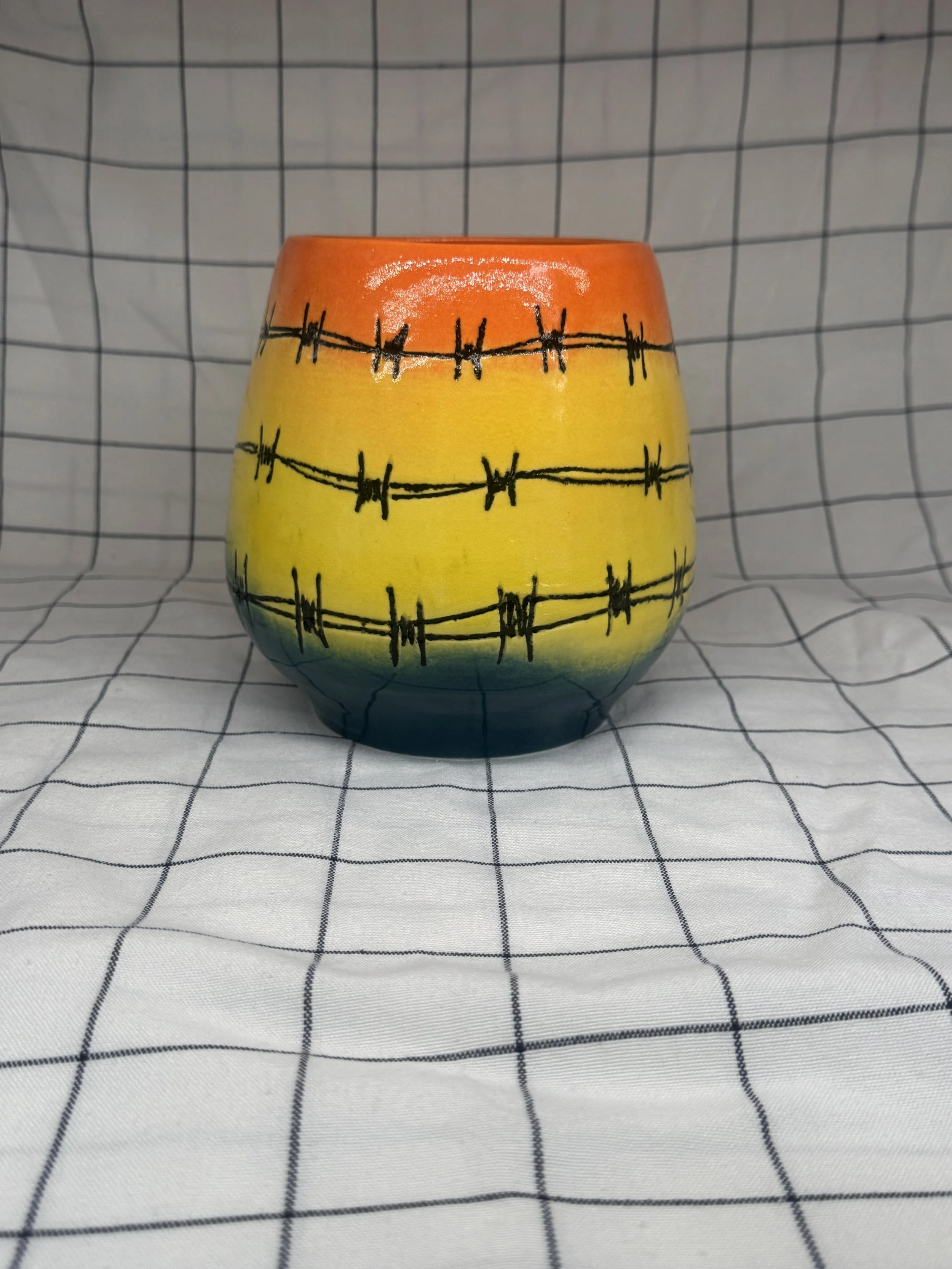 Sunset barbed wire vase