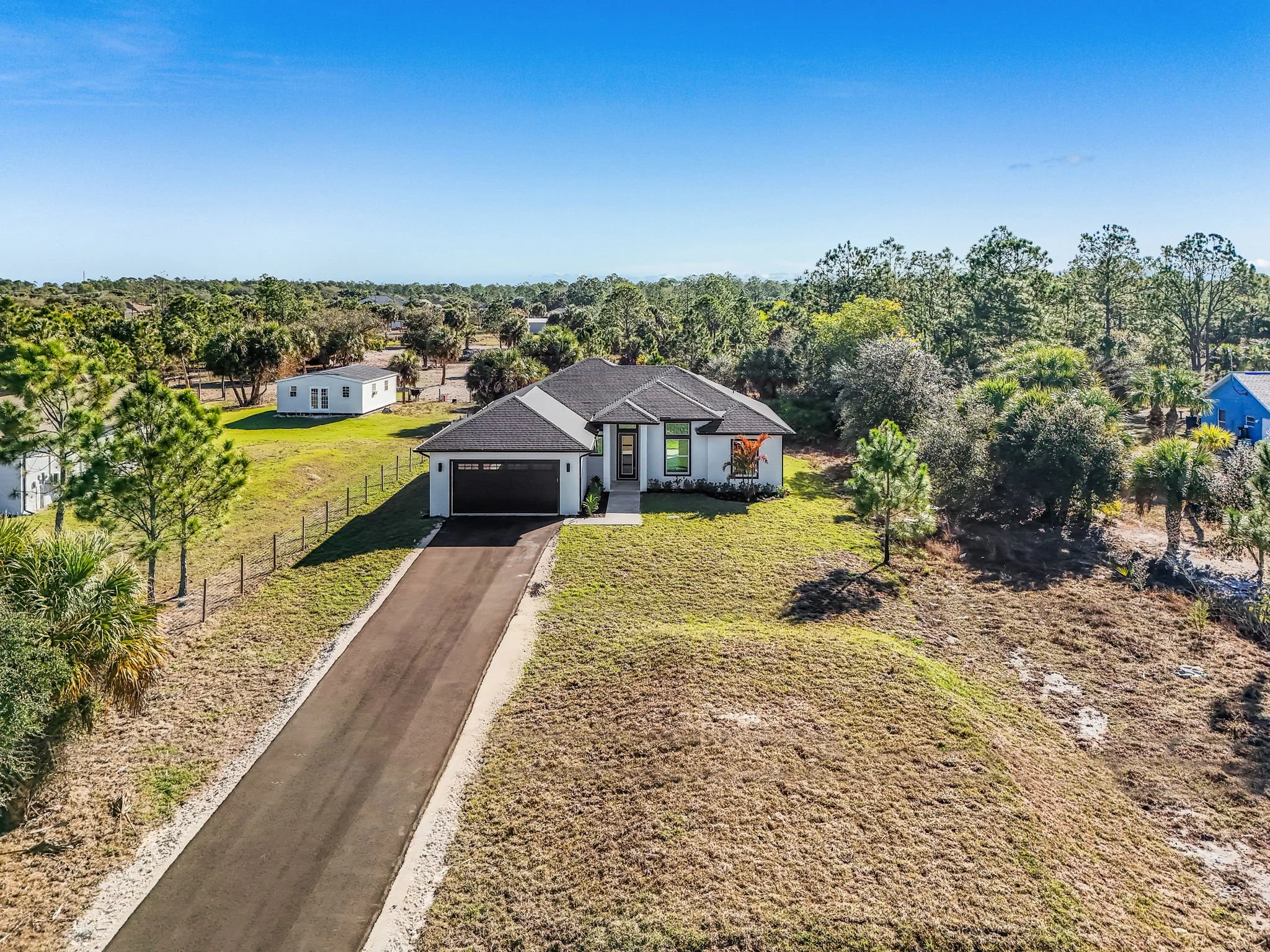 custom-home-exterior-acre-lot-naples-florida.jpg