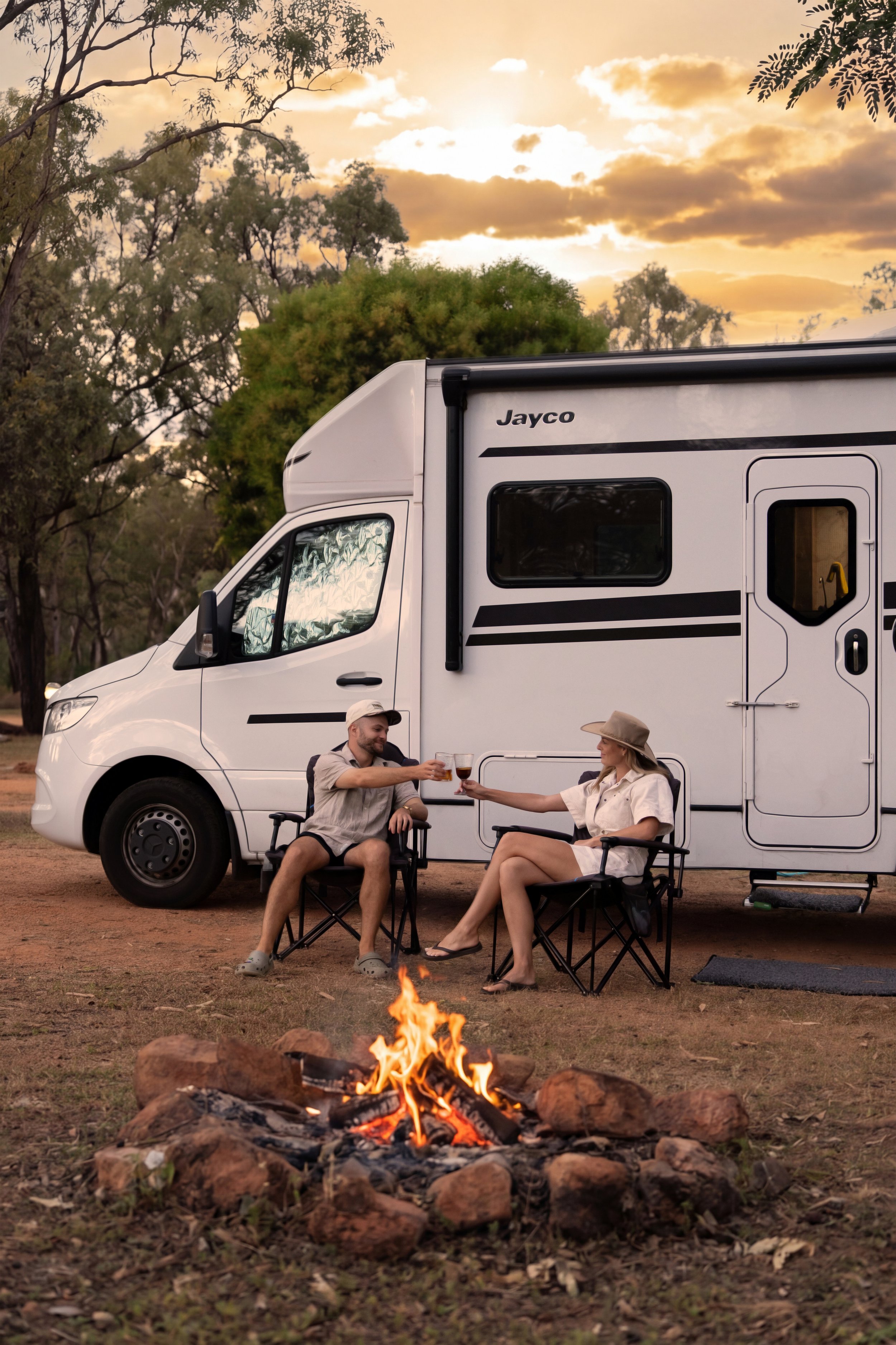 2026_05_01_Undara_Van_Fireplace_Lifestyle_Portrait.jpg