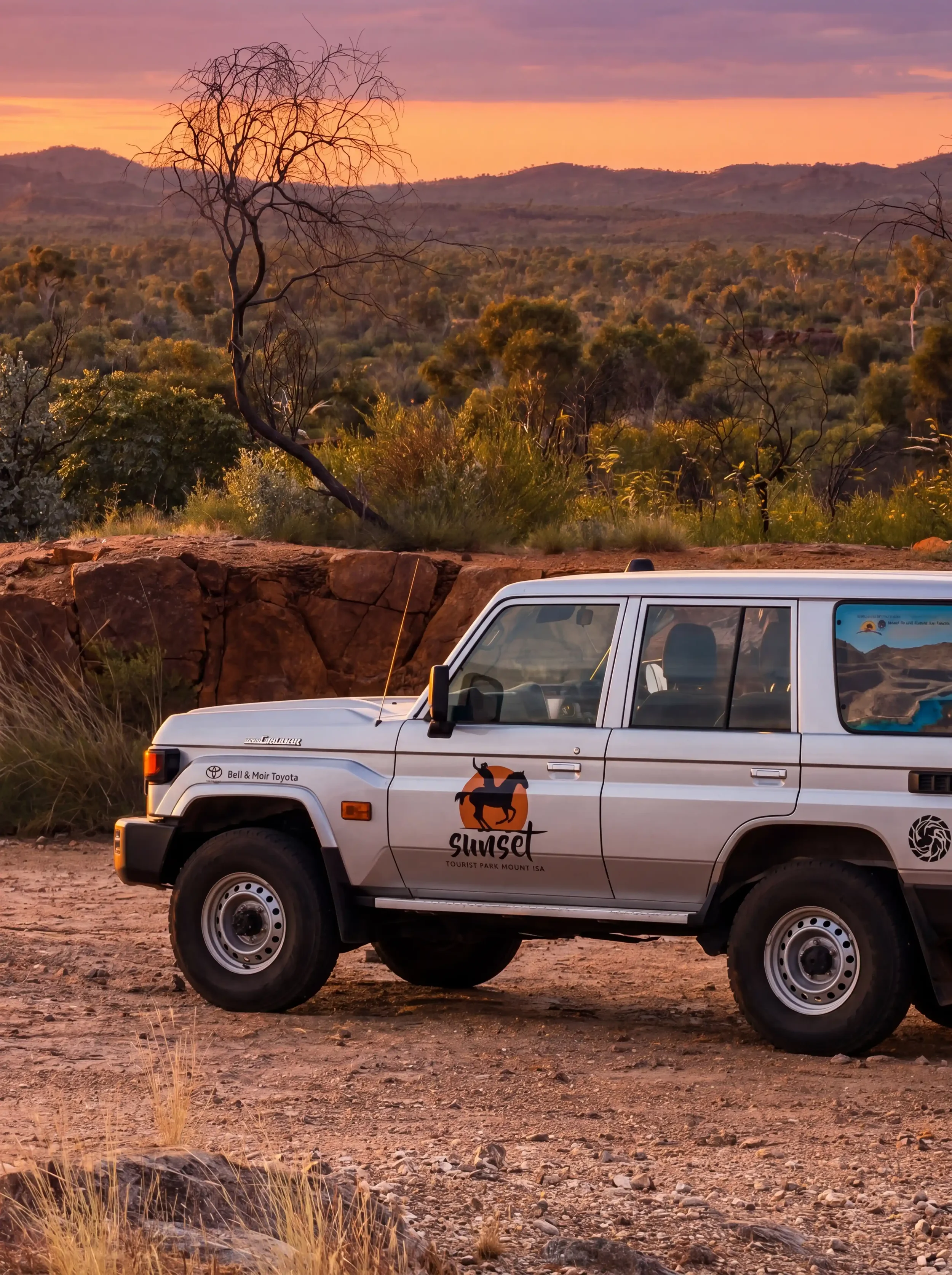 2026_05_07_GDayParks_SunsetTouristPark_Car_Sunset_Feature.webp
