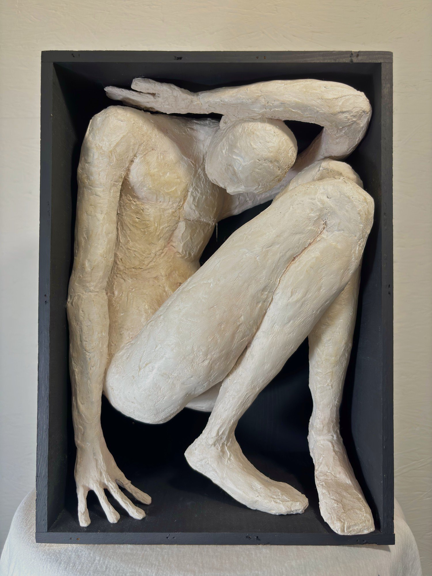 MAN IN A BOX No.1 14h x 10w x 7d in. paper mâché, plaster, joint compound, glue, dry pigment and shoe polish in an upcycled wine crate