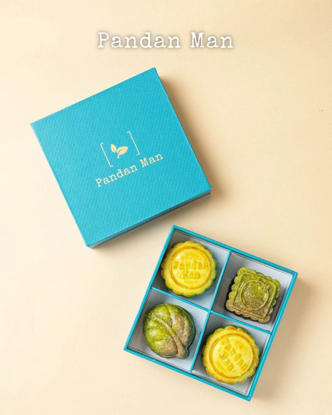 This is not your typical mooncake box. 👀🥮

Inside? Two standout flavours &mdash; one with white lotus seed and mochi, the other a golden custard with pandan lava. Plus, we&rsquo;ve included our Classic Pandan Chiffon Cake for good measure.

Click t